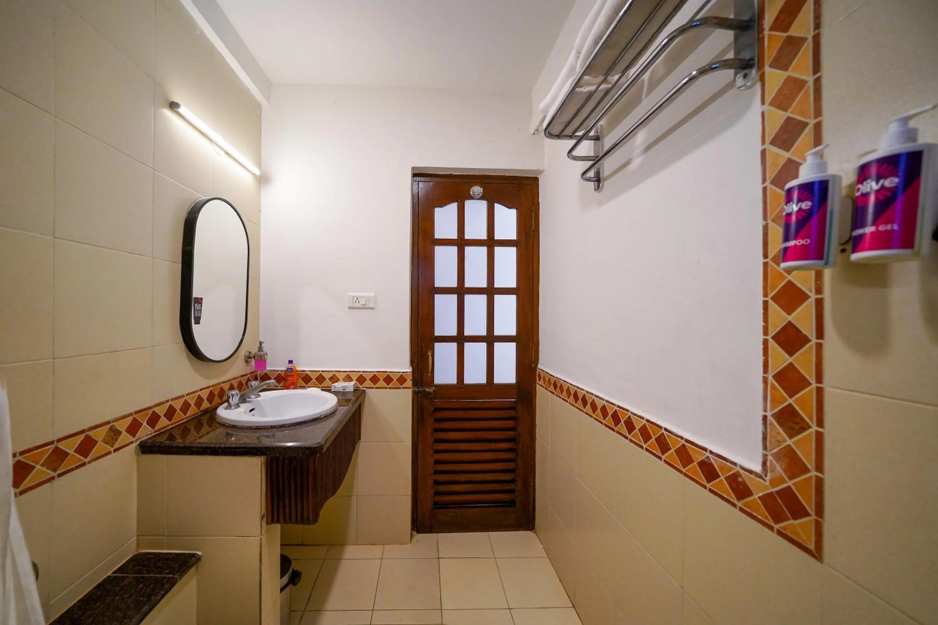 Bathroom in Olive Hotel Alidia Beach Resort by Embassy Group