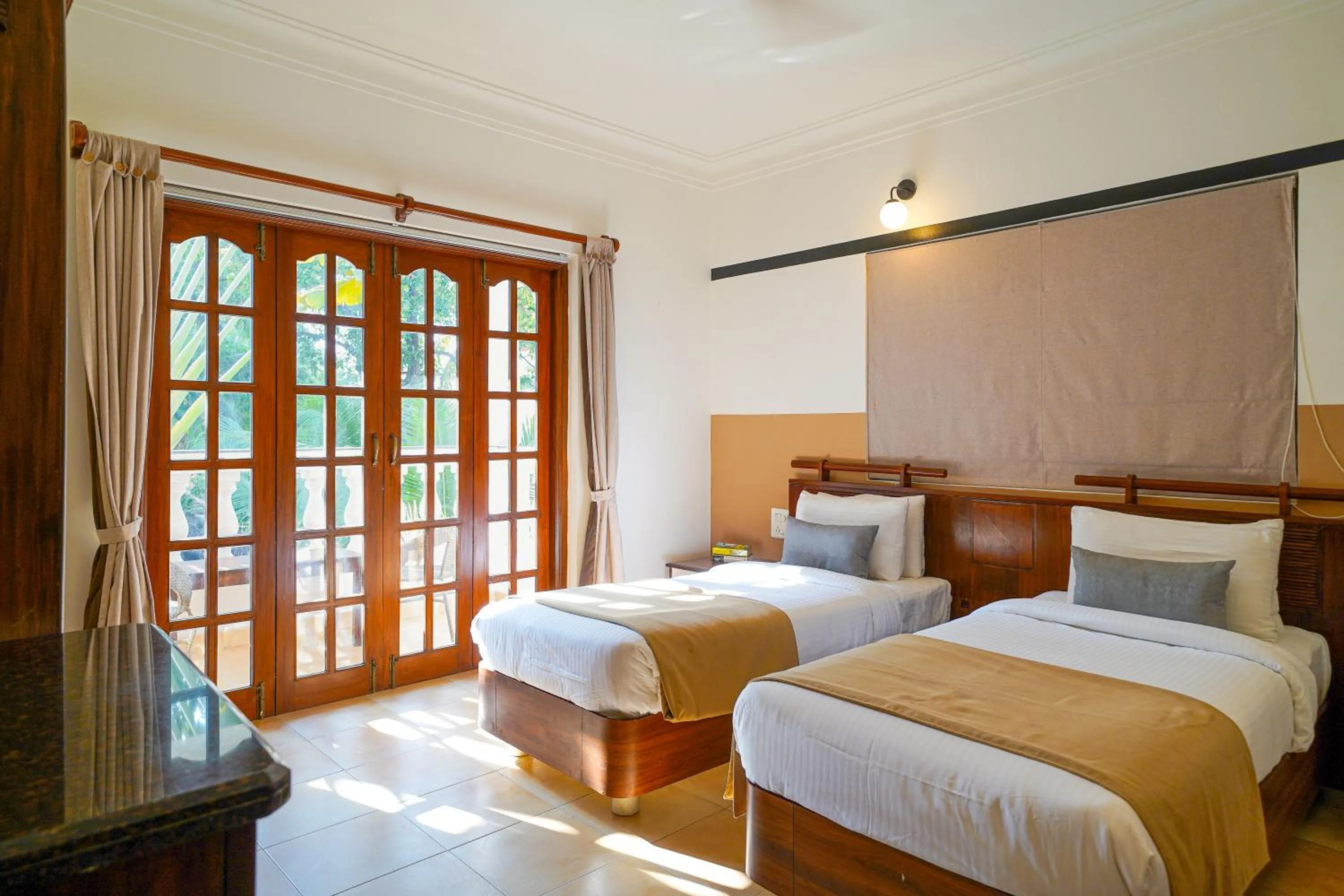 Bed in Olive Hotel Alidia Beach Resort by Embassy Group