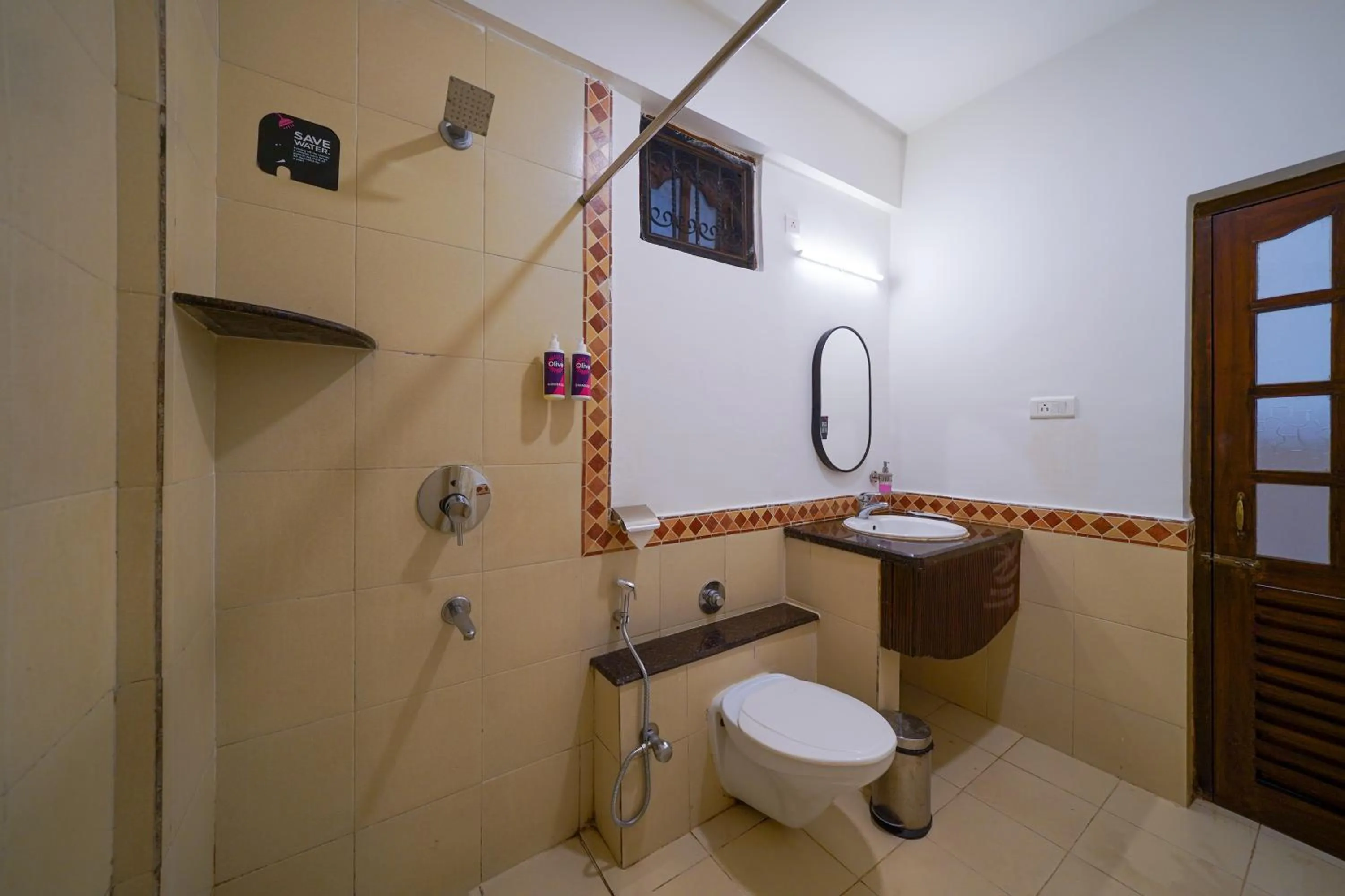 Shower in Olive Hotel Alidia Beach Resort by Embassy Group