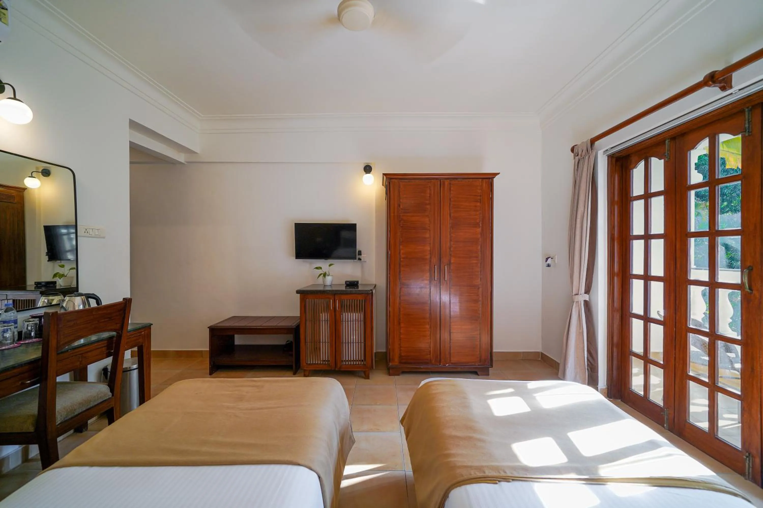 Bed in Olive Hotel Alidia Beach Resort by Embassy Group