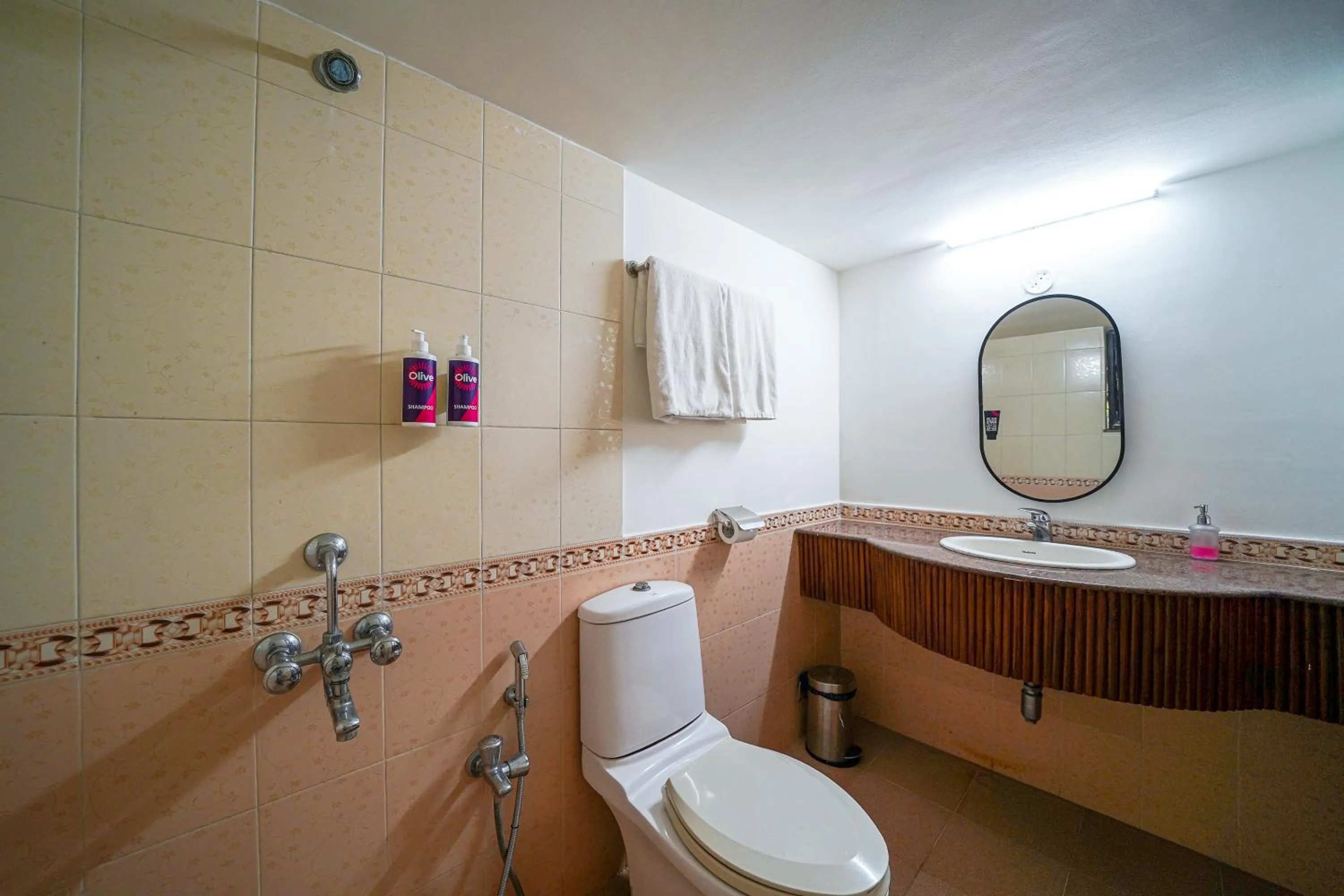 Toilet in Olive Hotel Alidia Beach Resort by Embassy Group