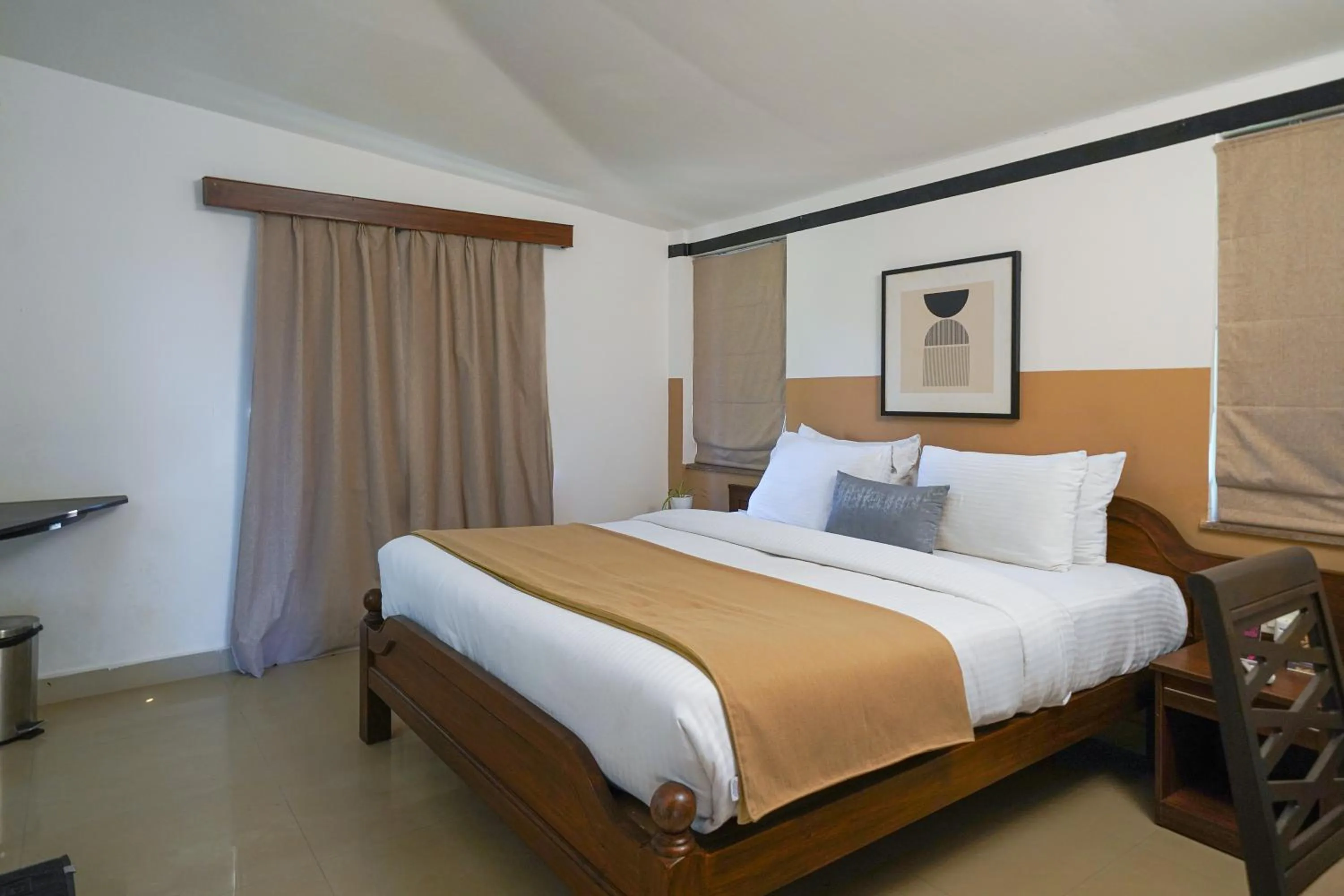 Bed in Olive Hotel Alidia Beach Resort by Embassy Group