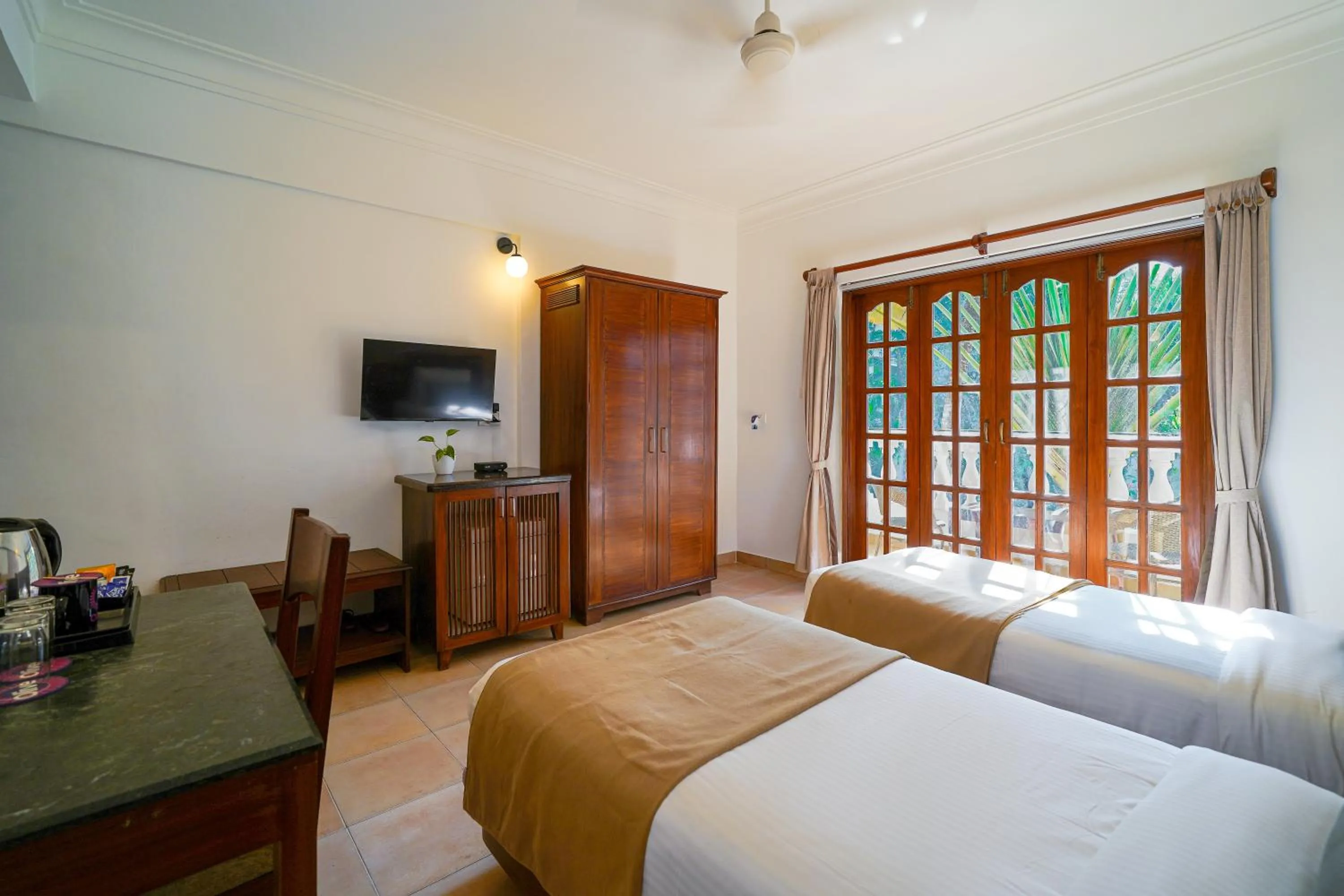 Bed in Olive Hotel Alidia Beach Resort by Embassy Group