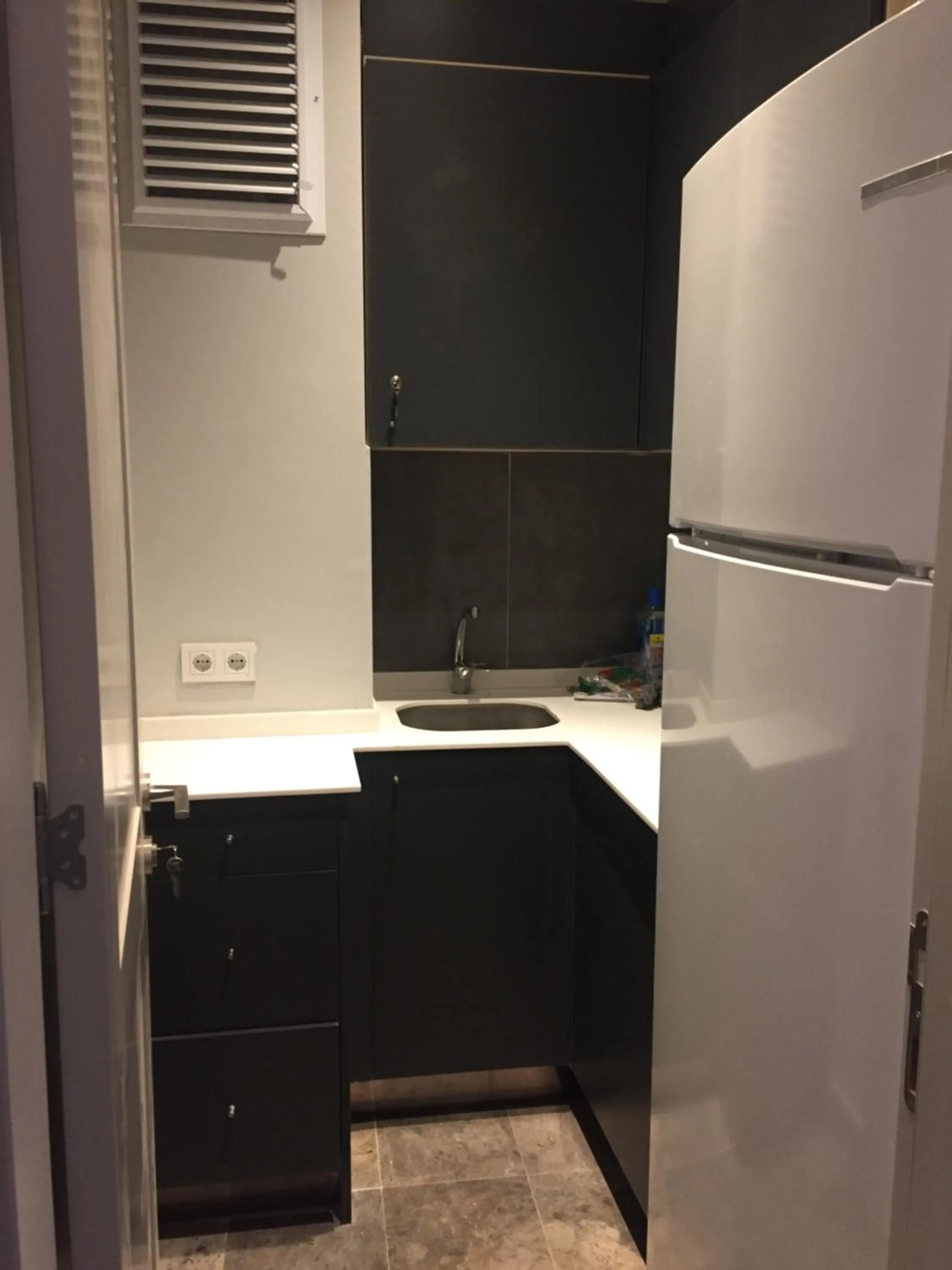 Communal kitchen in KONAK BELLA 3