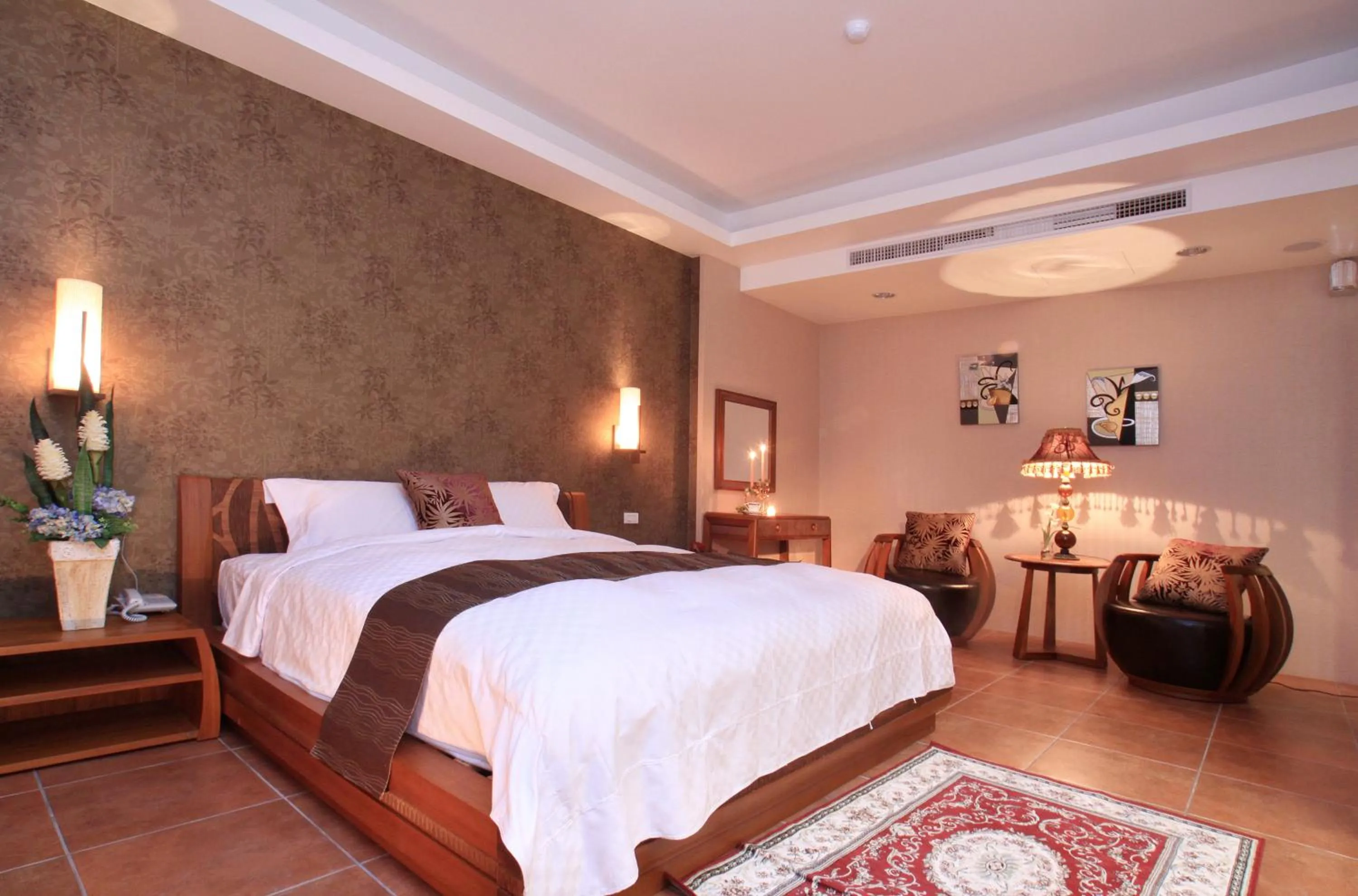 Bed in Spring Fountain Hotel