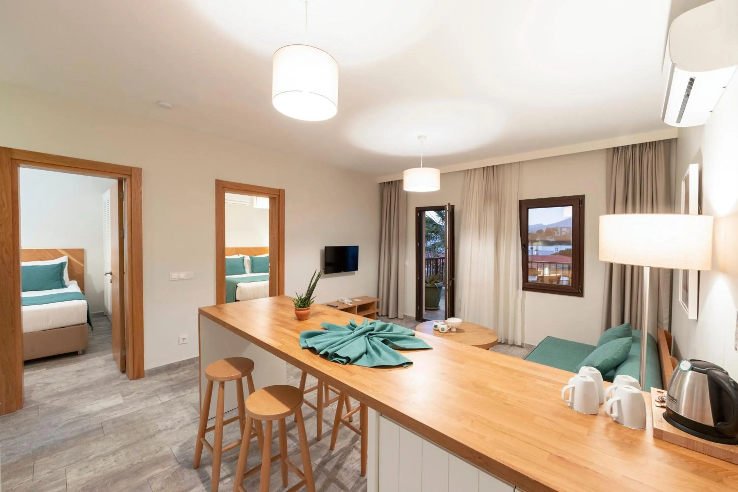 Living room, Bed in Dorman Suites