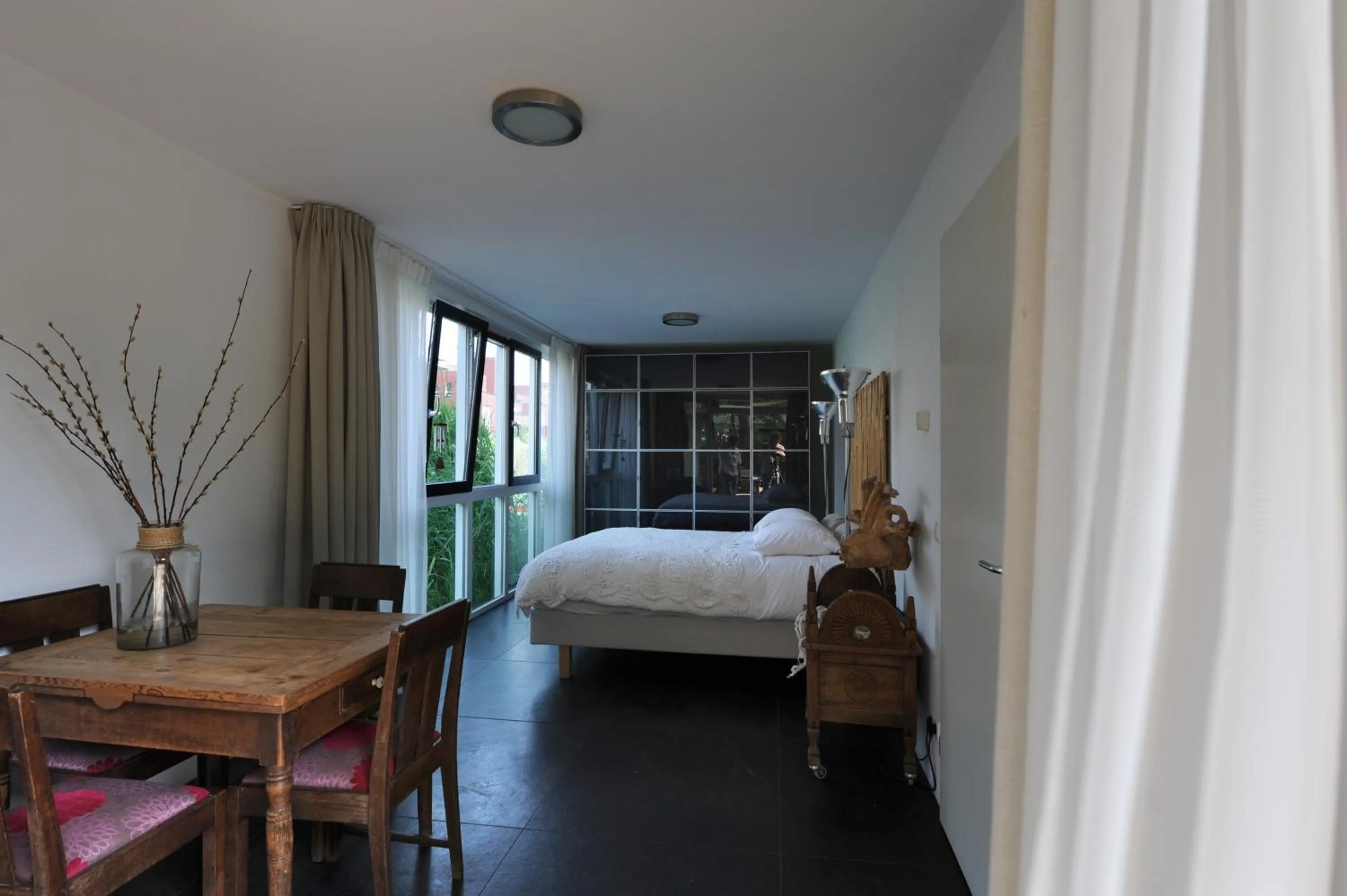 Photo of the whole room, Bed in The Green Tunnel