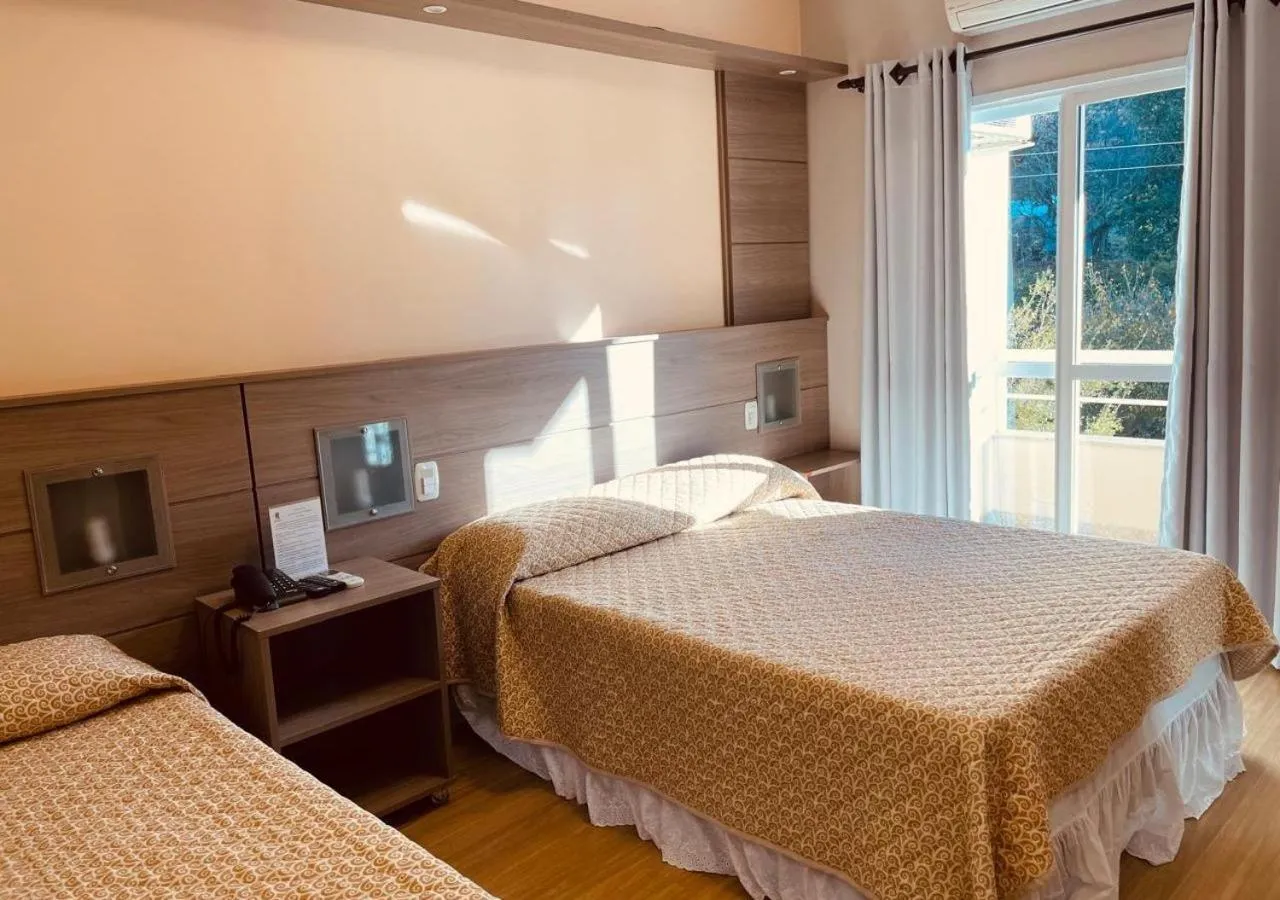 Bed in Dona Adelia Hotel e Restaurante