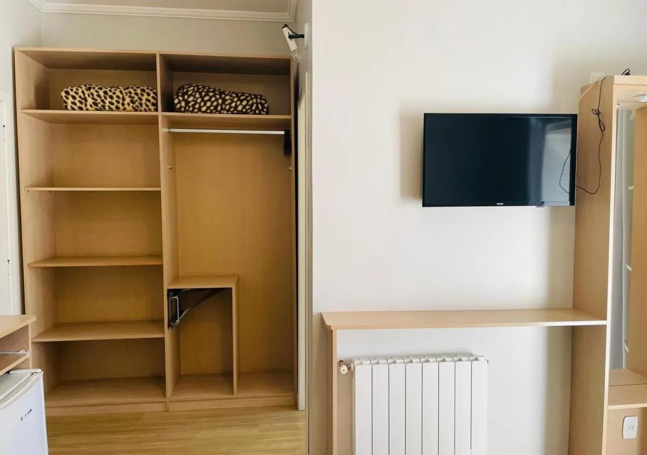 TV and multimedia in Dona Adelia Hotel e Restaurante