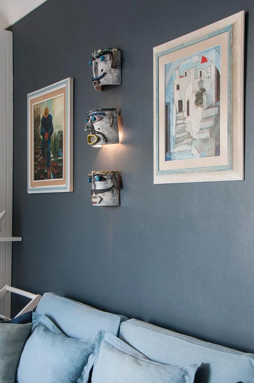 Communal lounge/ TV room in B&B Amalfè