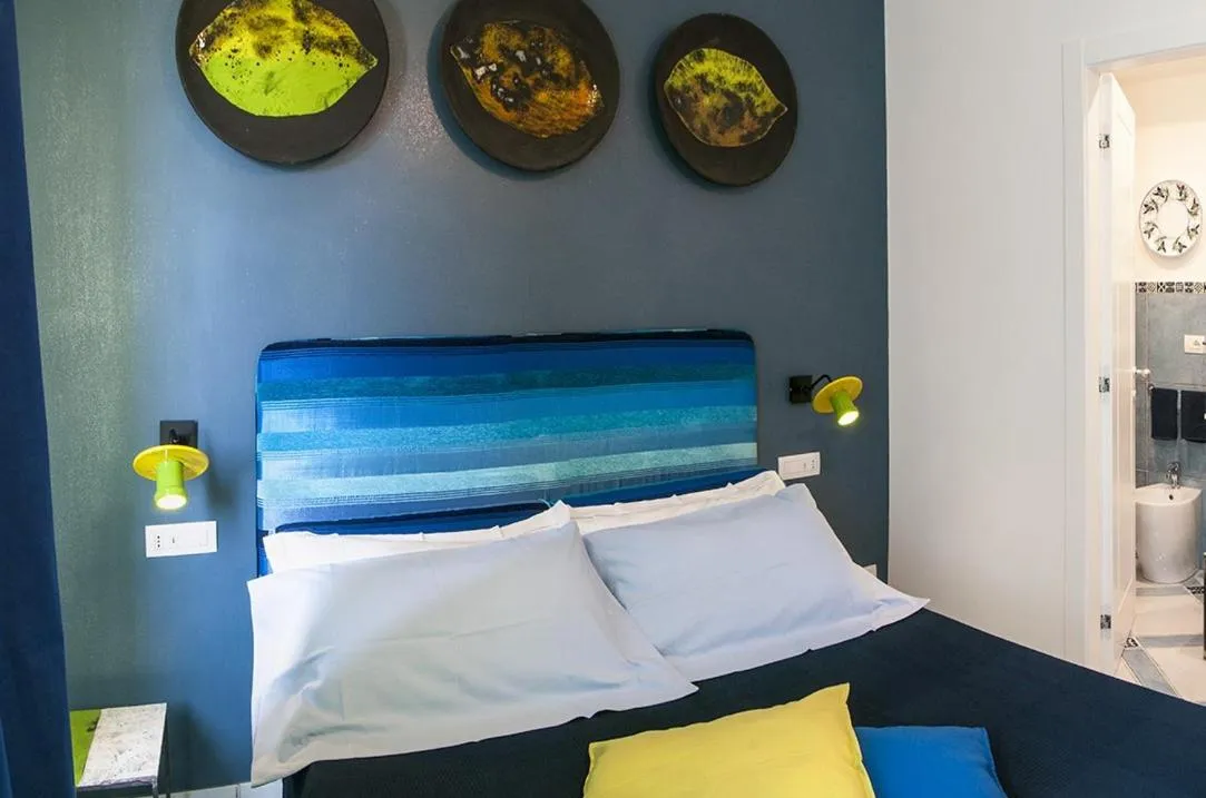 Bed in B&B Amalfè