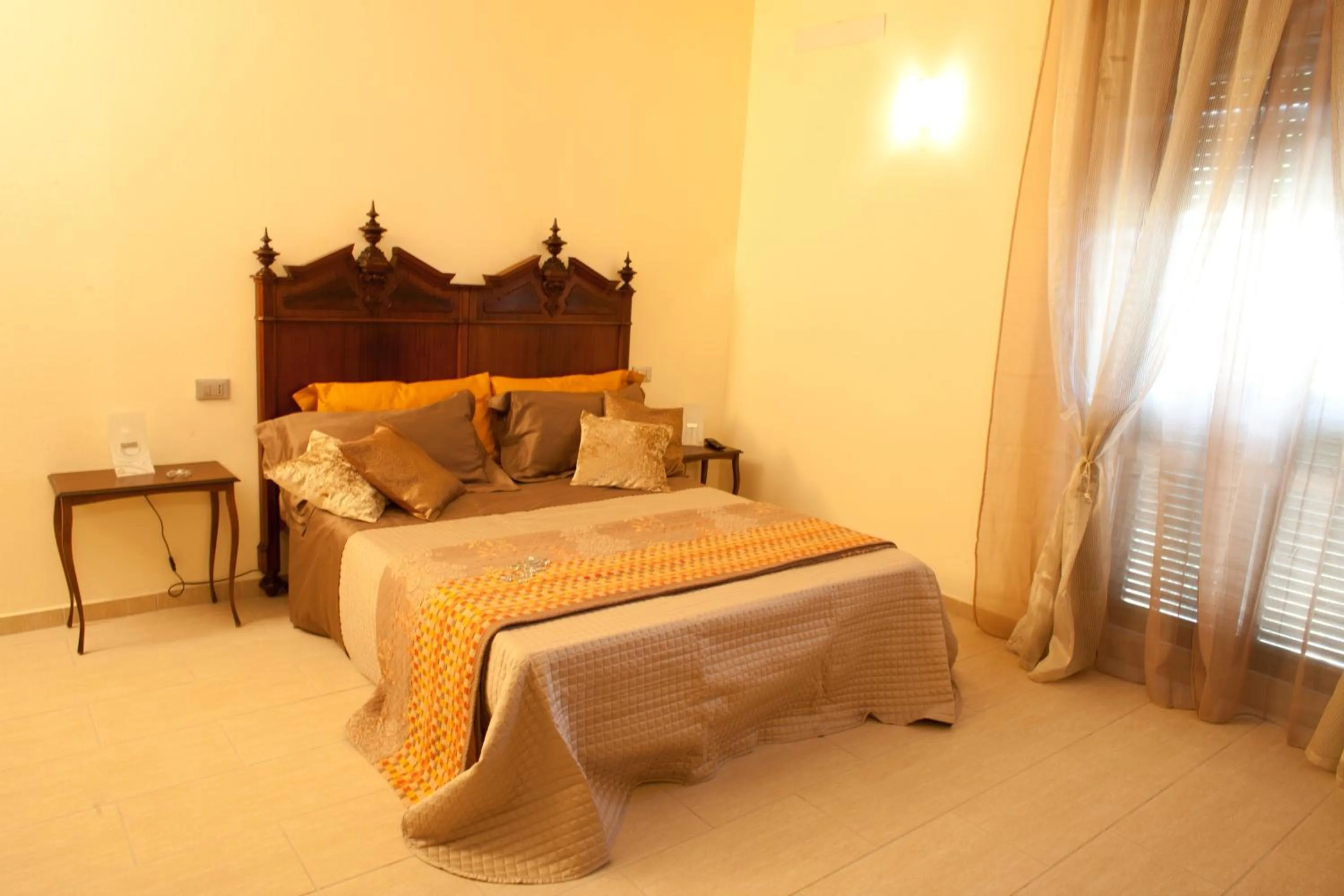 Decorative detail, Bed in B&B Al Calcandola