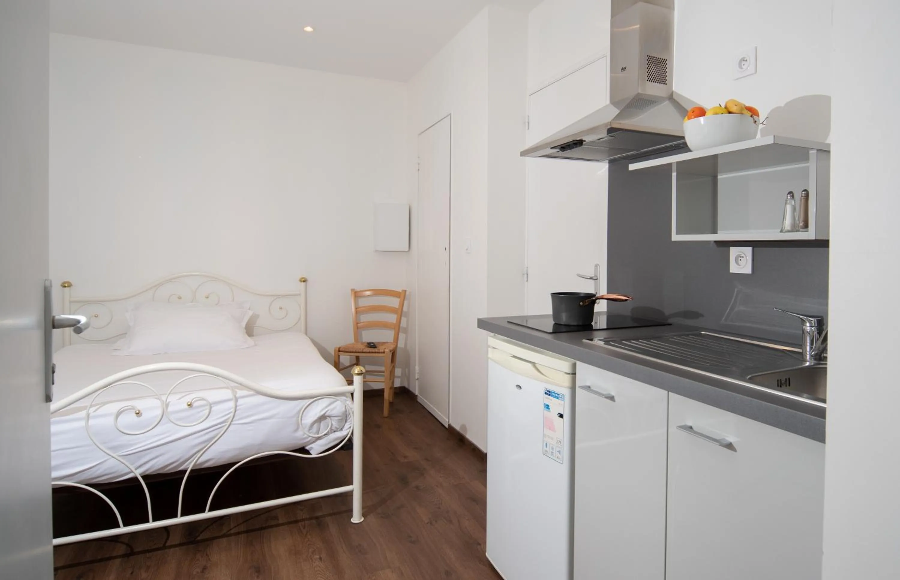 Bed in Logis Hôtel-restaurant Les Coudercous