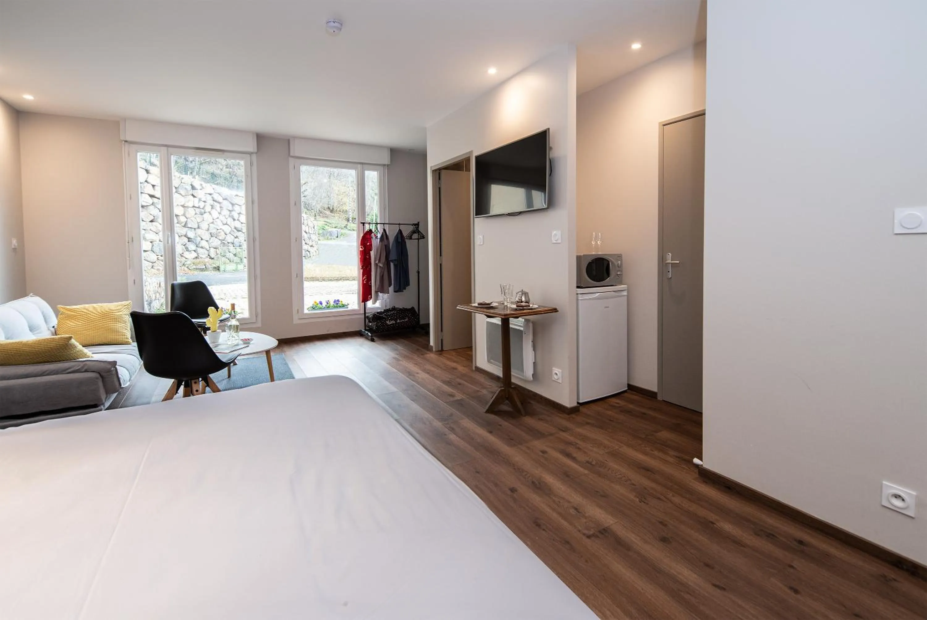 Bed in Logis Hôtel-restaurant Les Coudercous