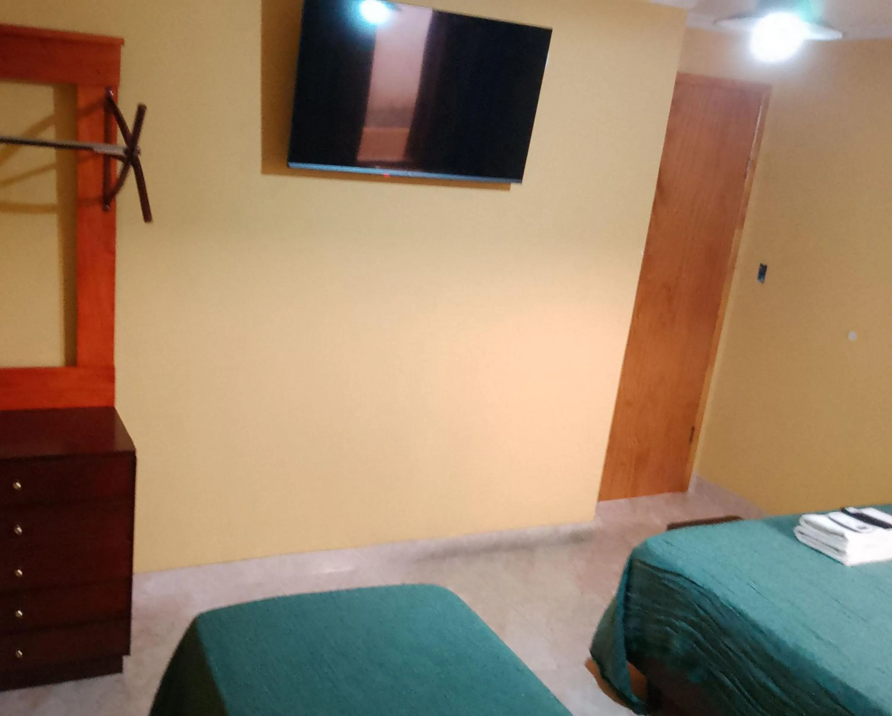 Bed in El Uru Suite Hotel