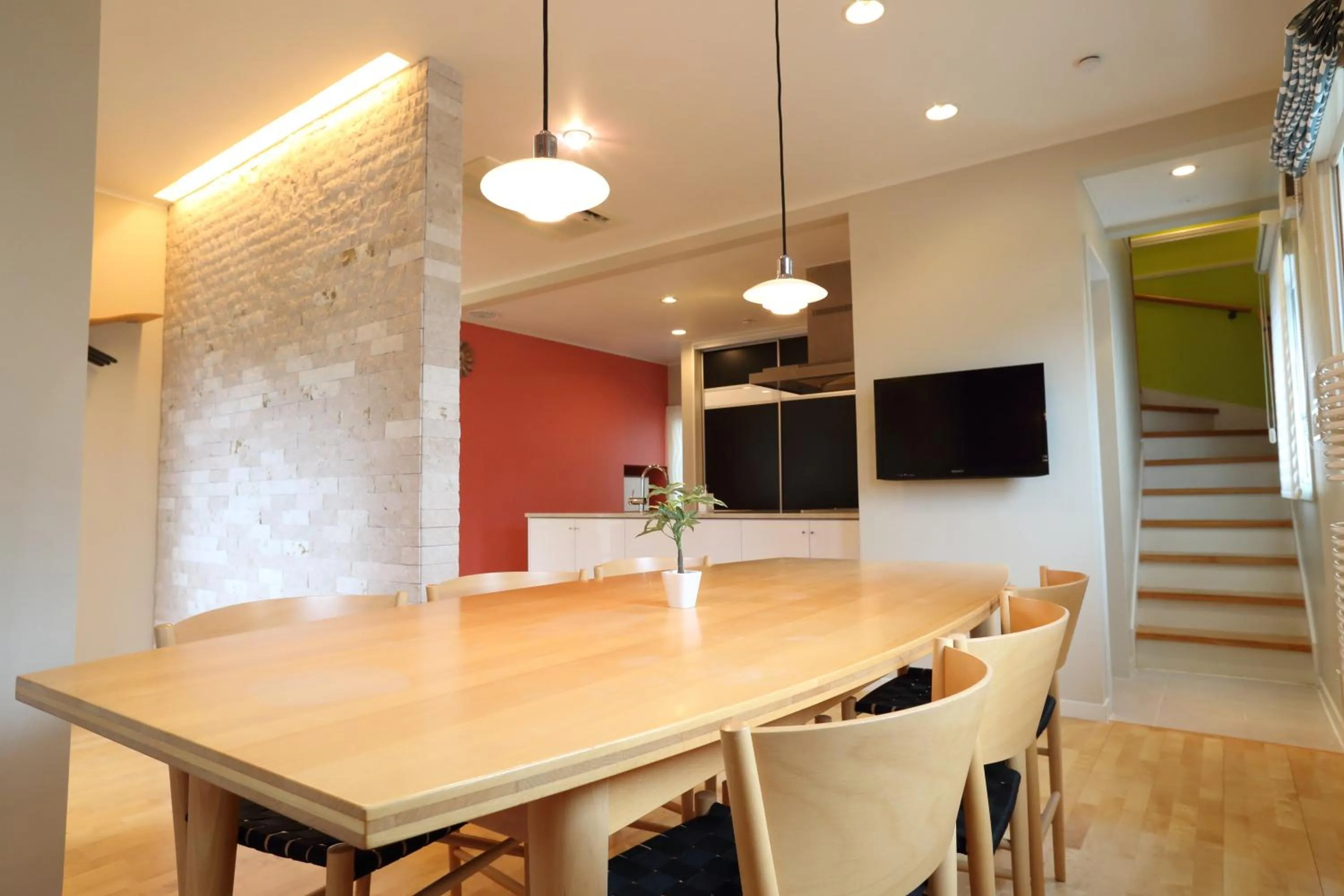 Dining area in Tabinoteitaku Kamakura Yuigahama -Homann Concept-