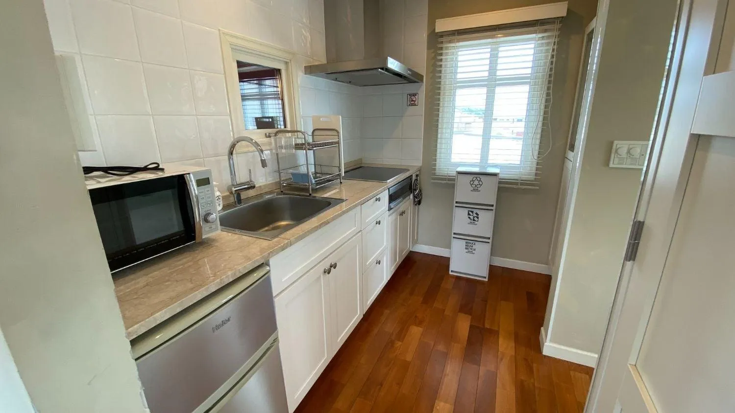 Kitchen or kitchenette in Tabinoteitaku Kamakura Yuigahama -Homann Concept-