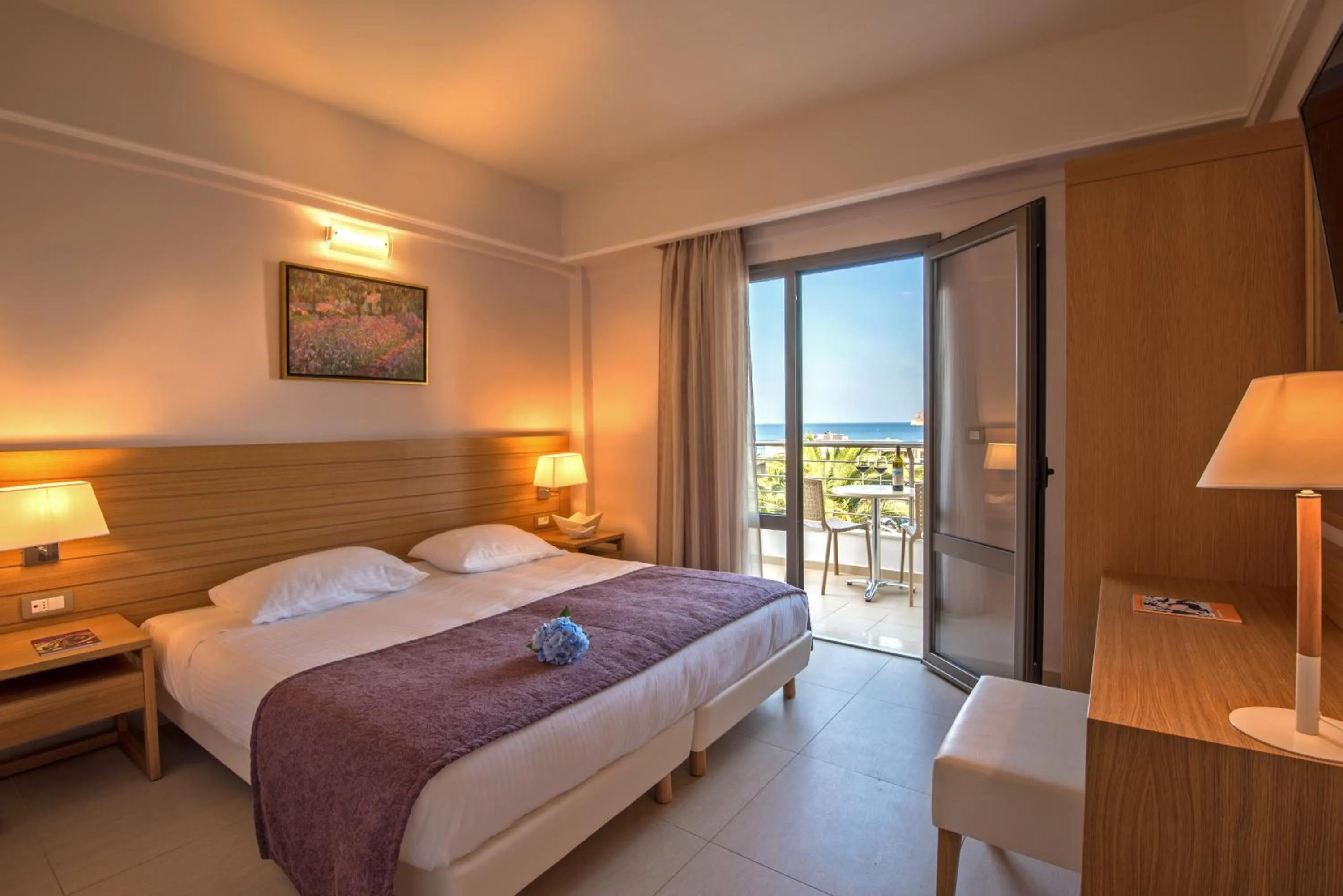 Photo of the whole room, Bed in Porto Platanias Village Resort