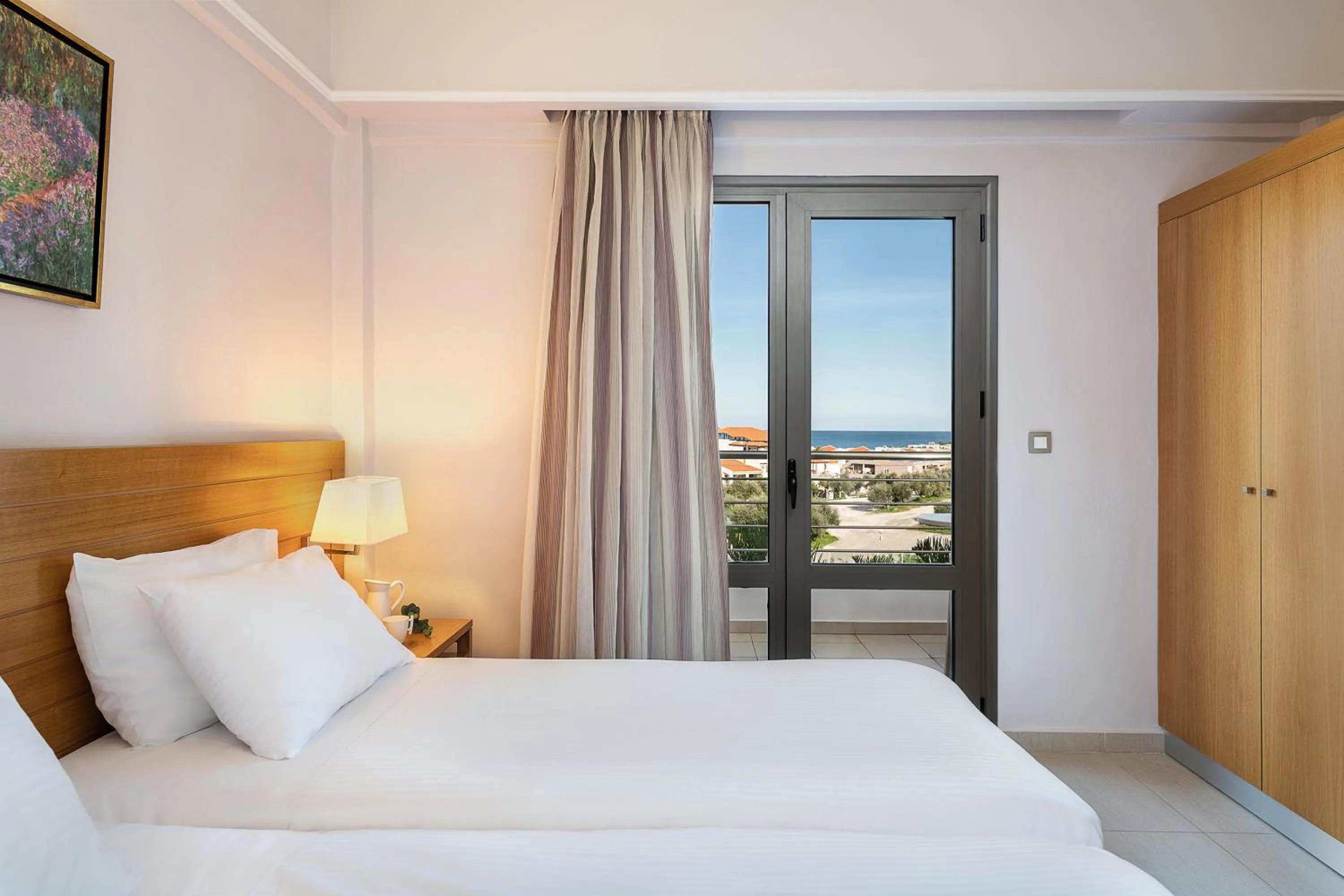 Bed in Porto Platanias Village Resort