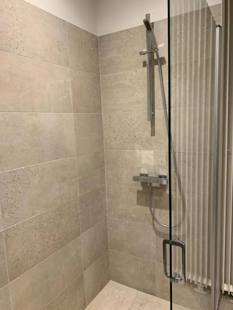 Bathroom in LA COUR CARREE - chambres d'hôtes