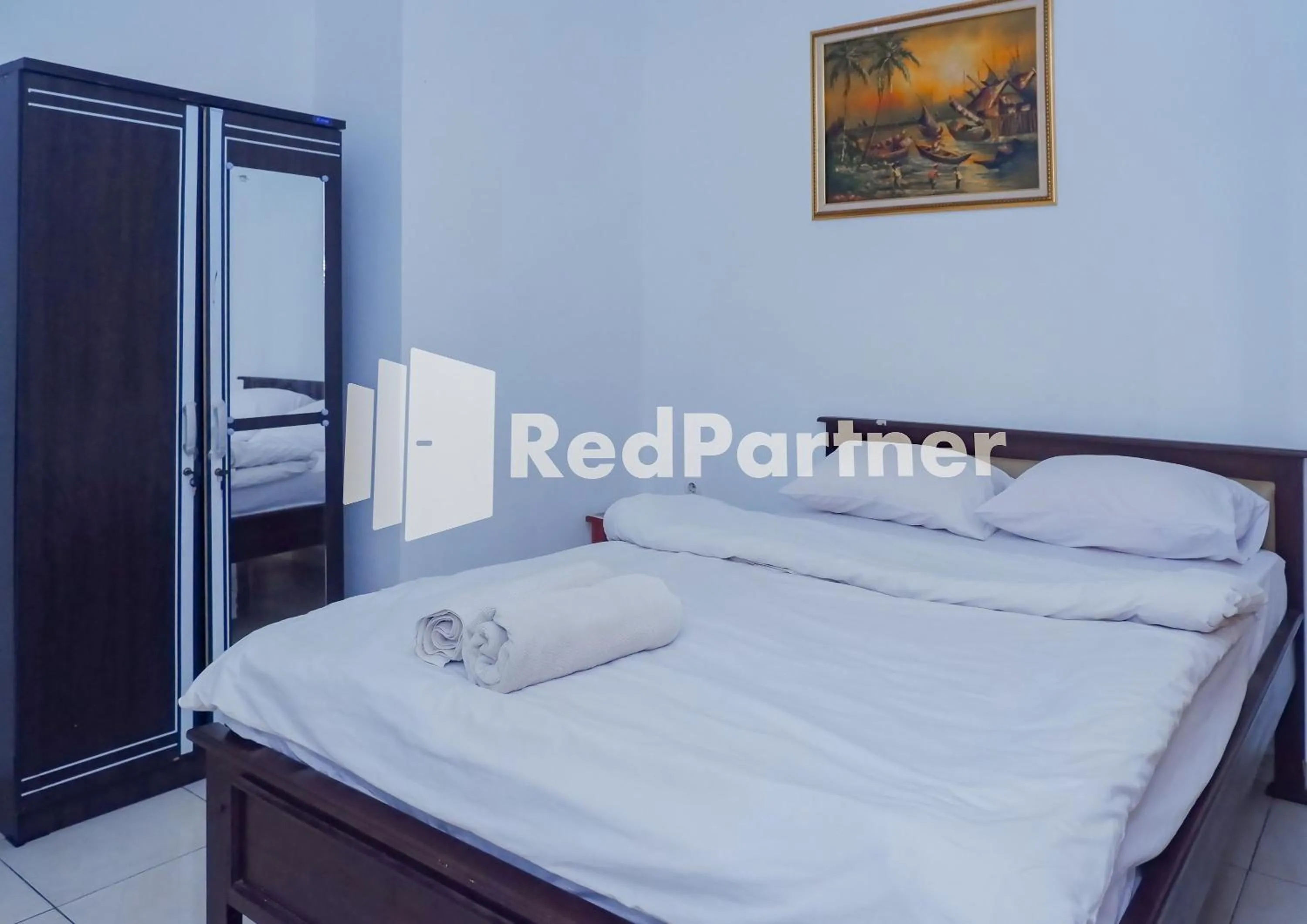 Bedroom, Bed in MS Hotel Pangandaran Mitra RedDoorz