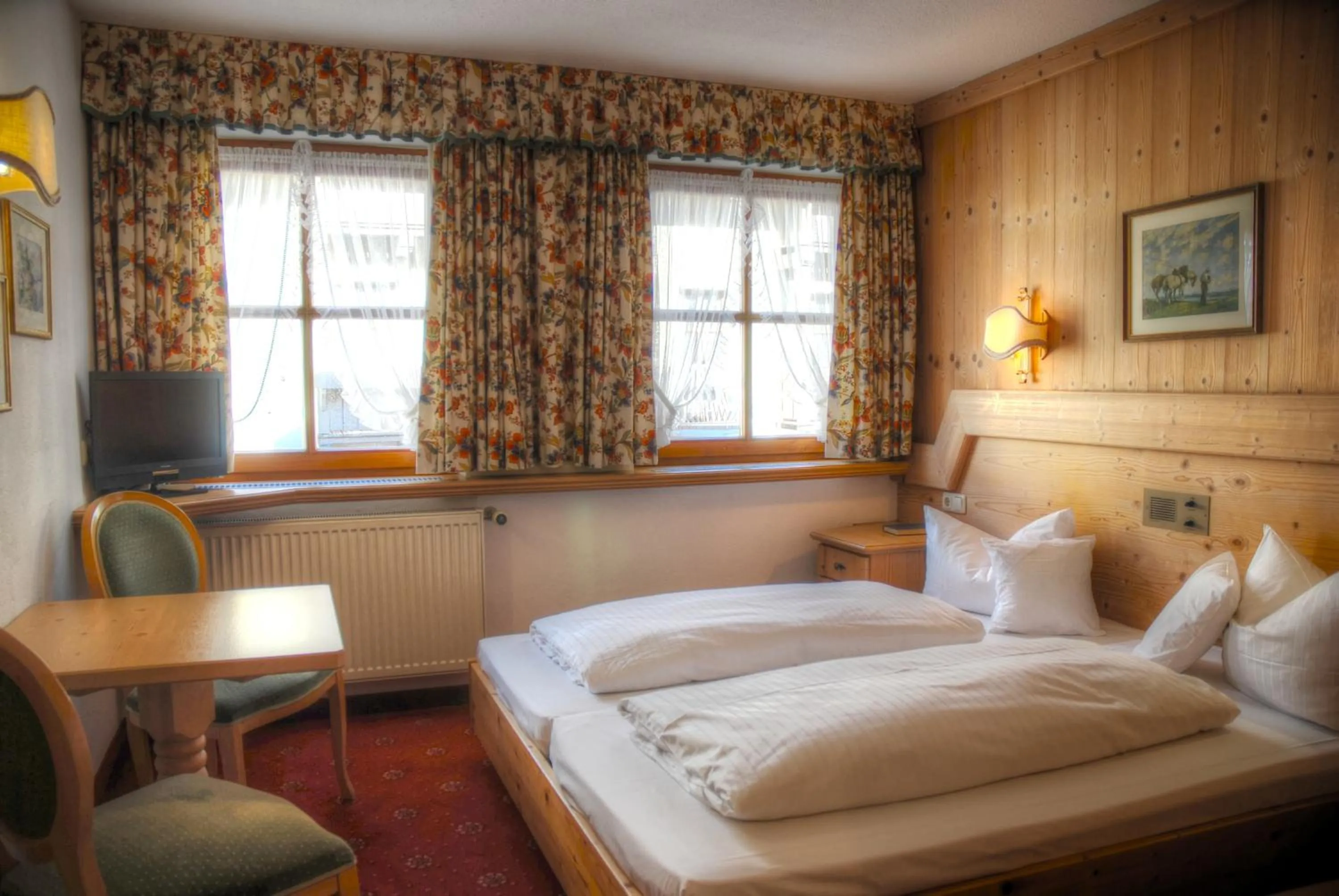 Photo of the whole room, Bed in Hotel Hölzer Bräu by Lehmann Hotels