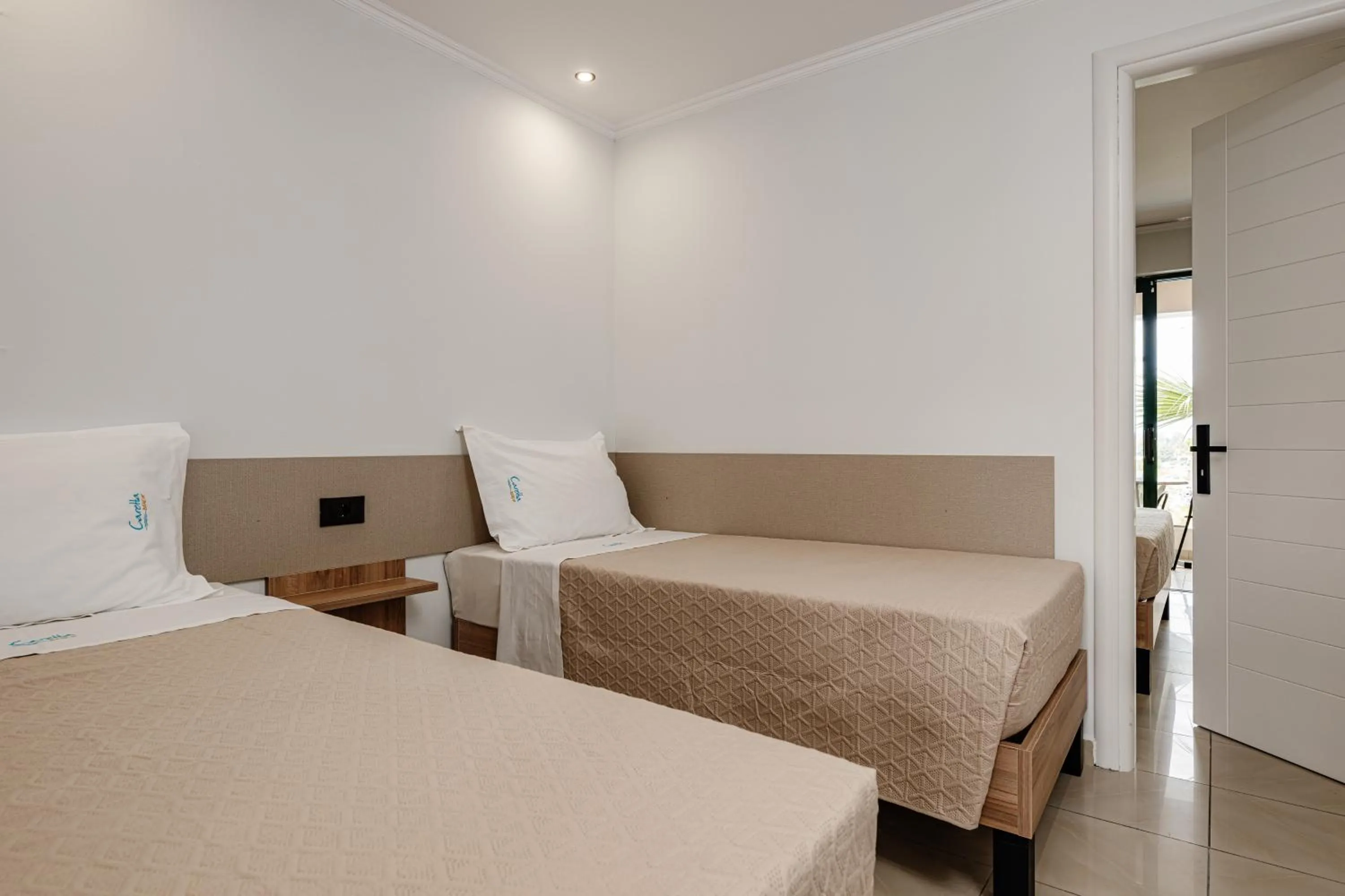 Bed in Caretta Beach Resort & WaterPark