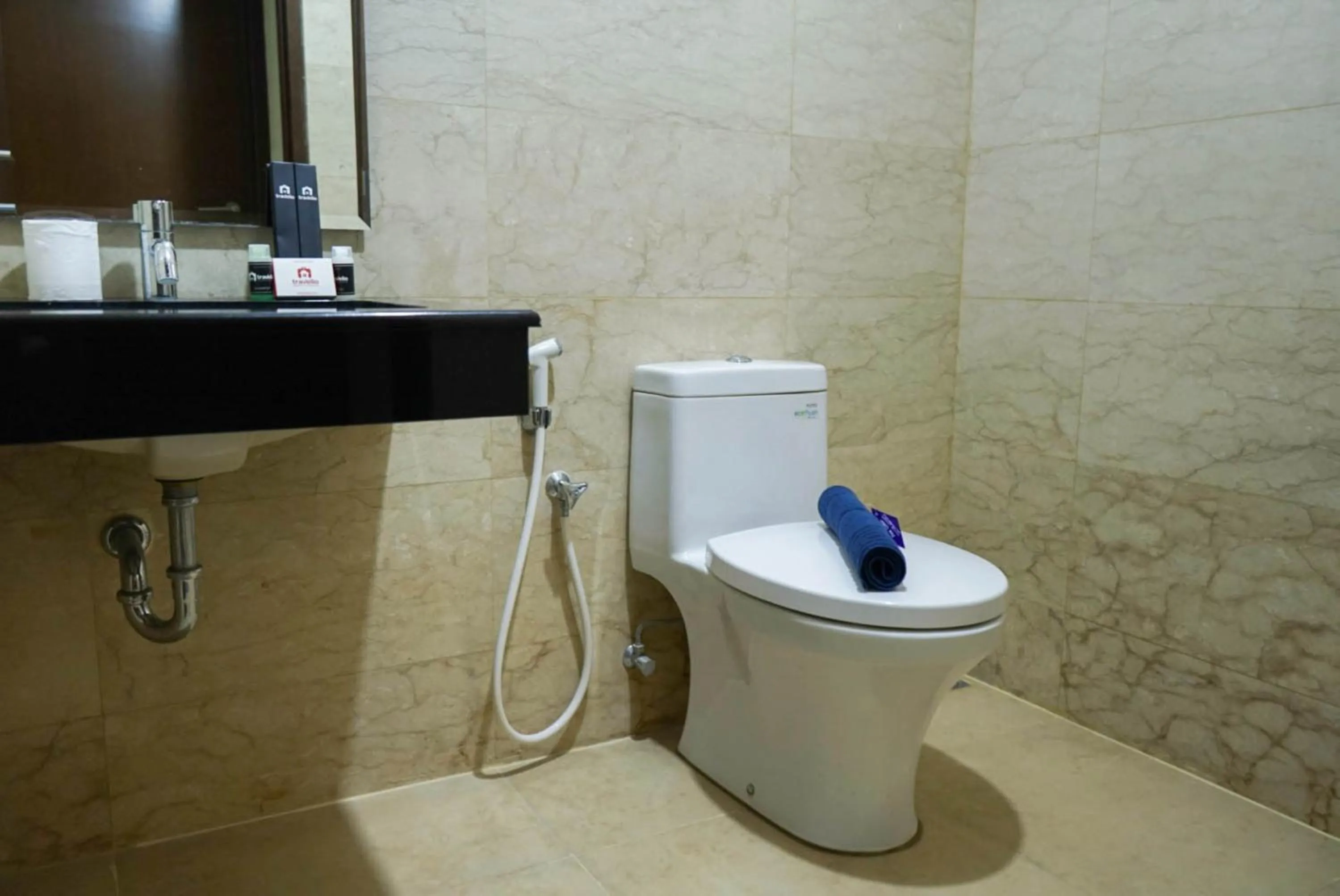 Bathroom in 2BR with Study Room at L'Avenue Apartment By Travelio