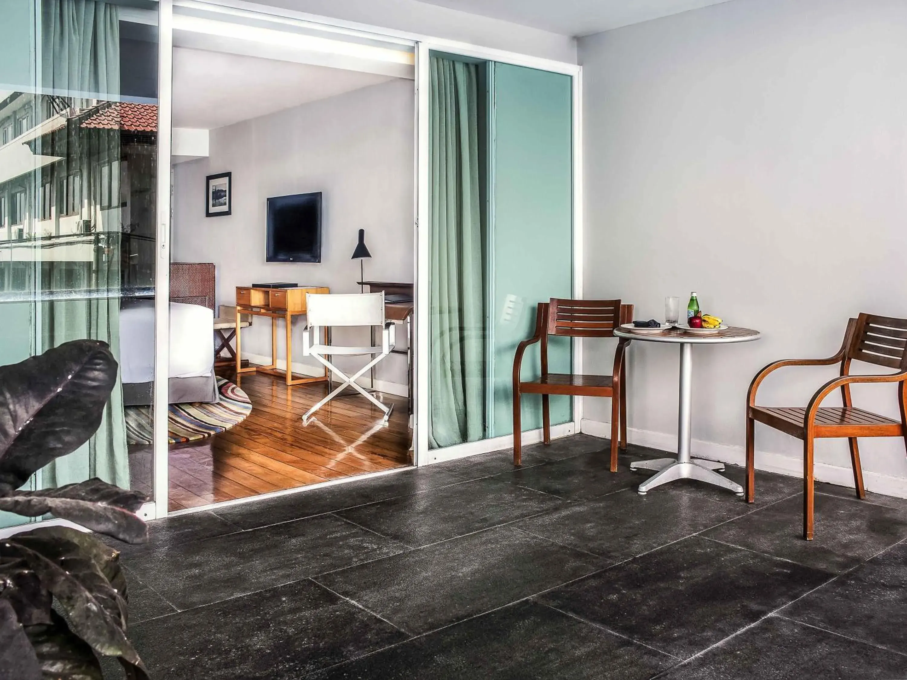 Deluxe Heritage King Room with Shared Plunge Pool in The Kuta Beach Heritage Hotel - Managed by Accor Deluxe Heritage King Room with Shared Plunge Pool in The Kuta Beach Heritage Hotel - Managed by Accor