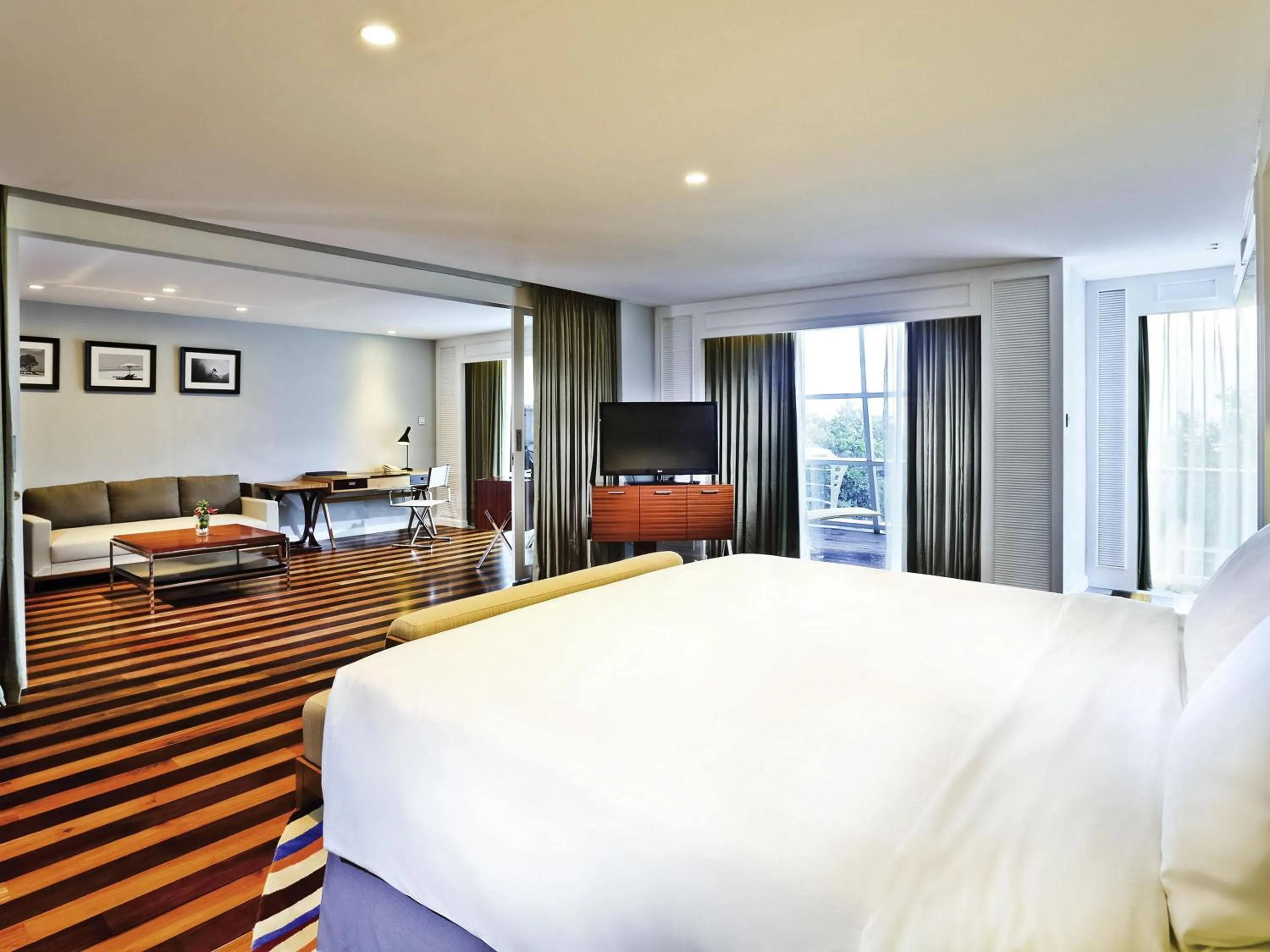 Bedroom, Bed in The Kuta Beach Heritage Hotel - Managed by Accor