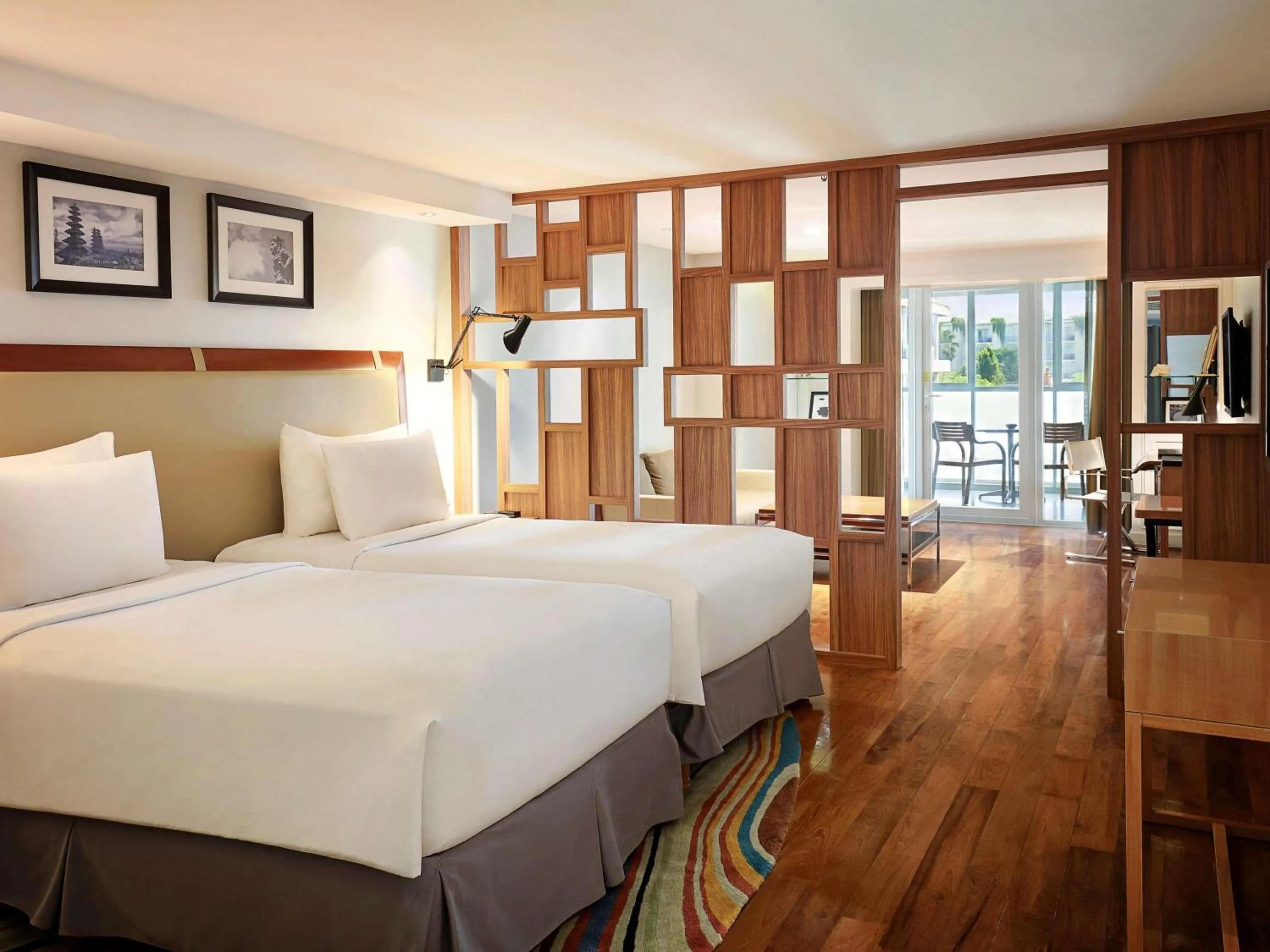 Bedroom, Bed in The Kuta Beach Heritage Hotel - Managed by Accor