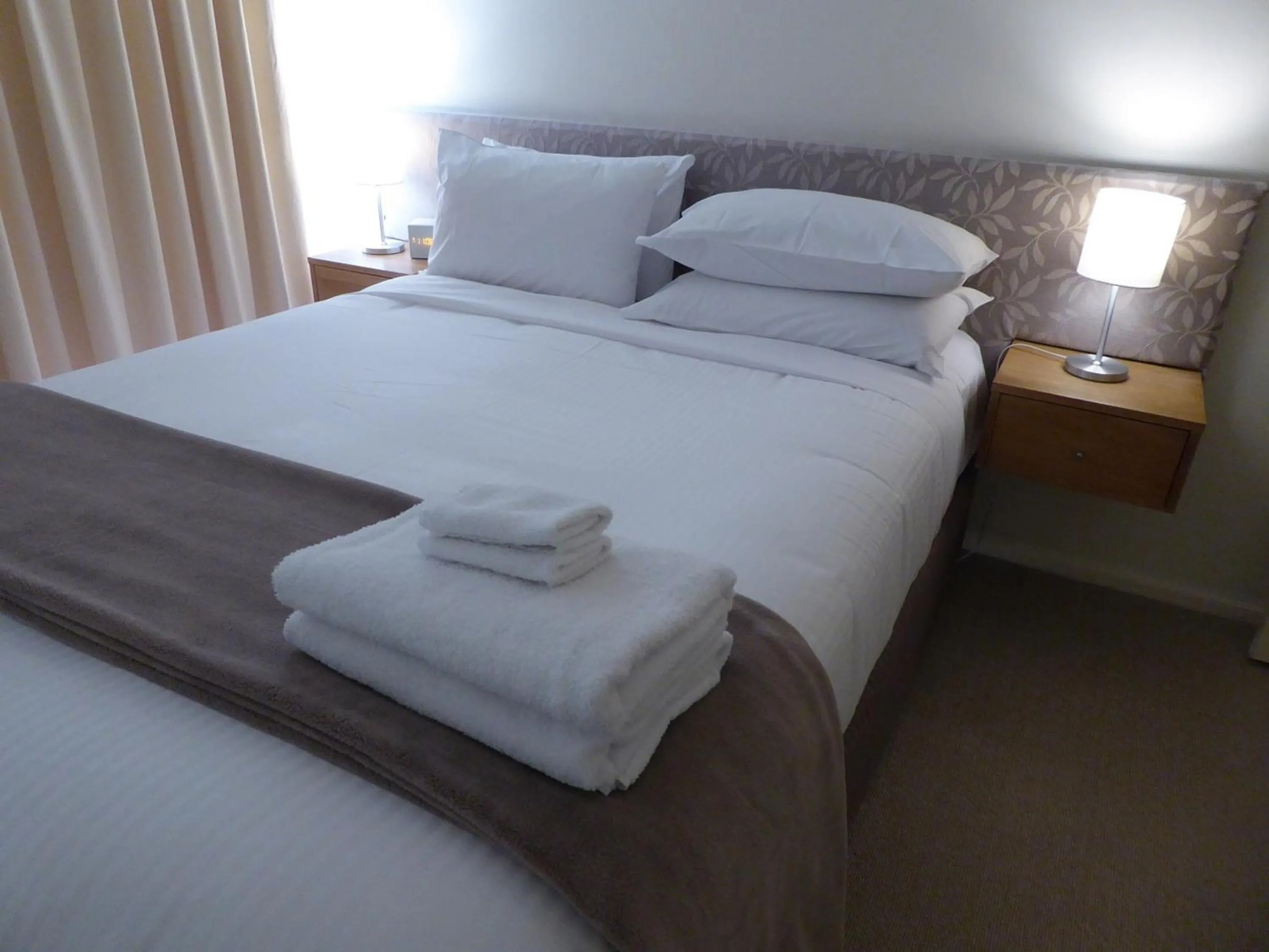 Bedroom, Bed in Lifestyle Apartments at Ferntree