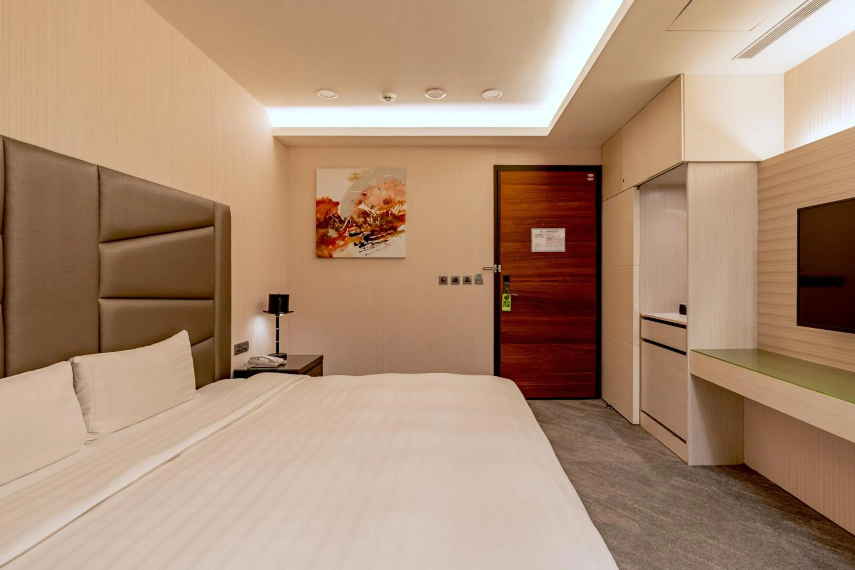 Bed in Hotel Geight Taipei