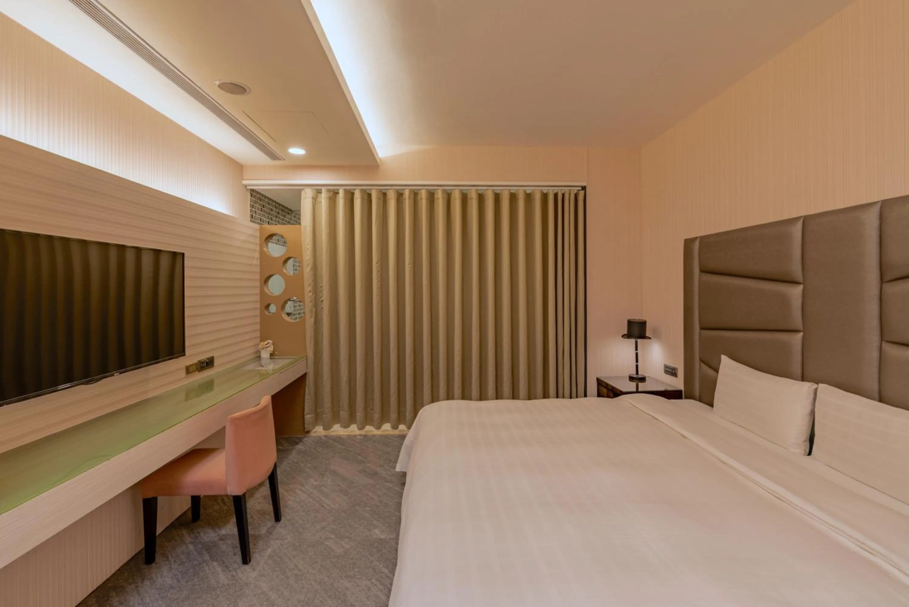 Bed in Hotel Geight Taipei