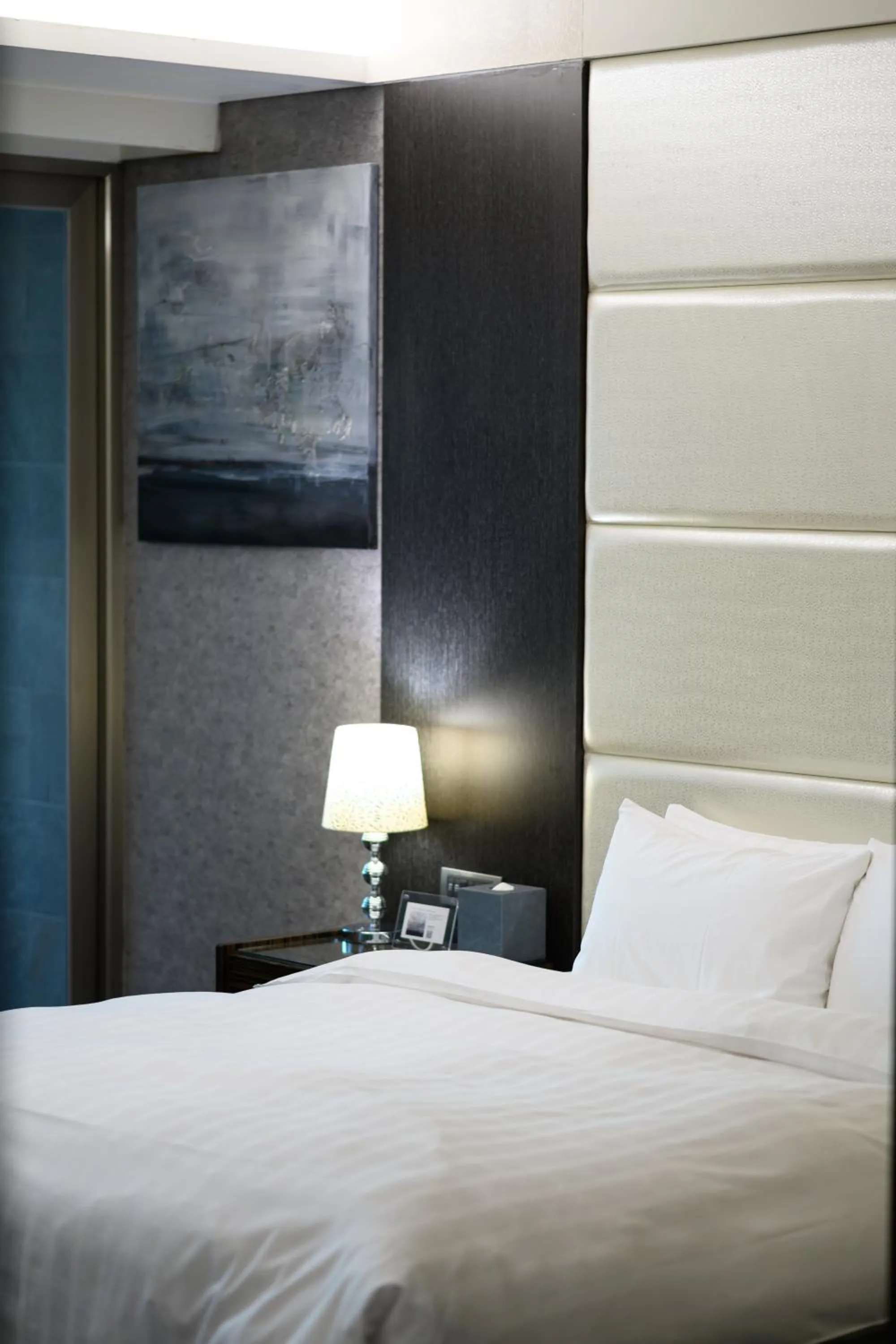 Bed in Hotel Geight Taipei