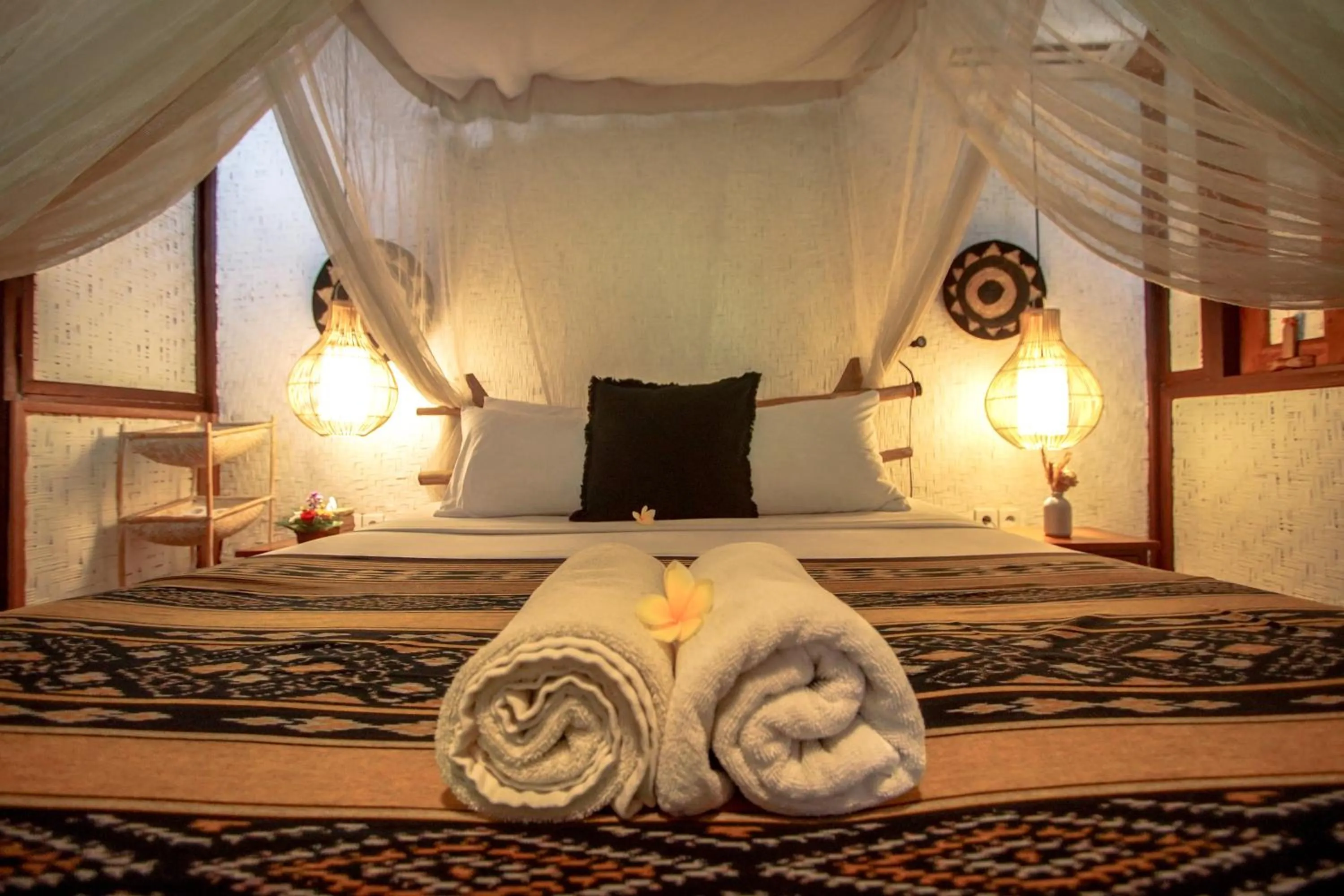 Bed in The Calmtree Bungalows