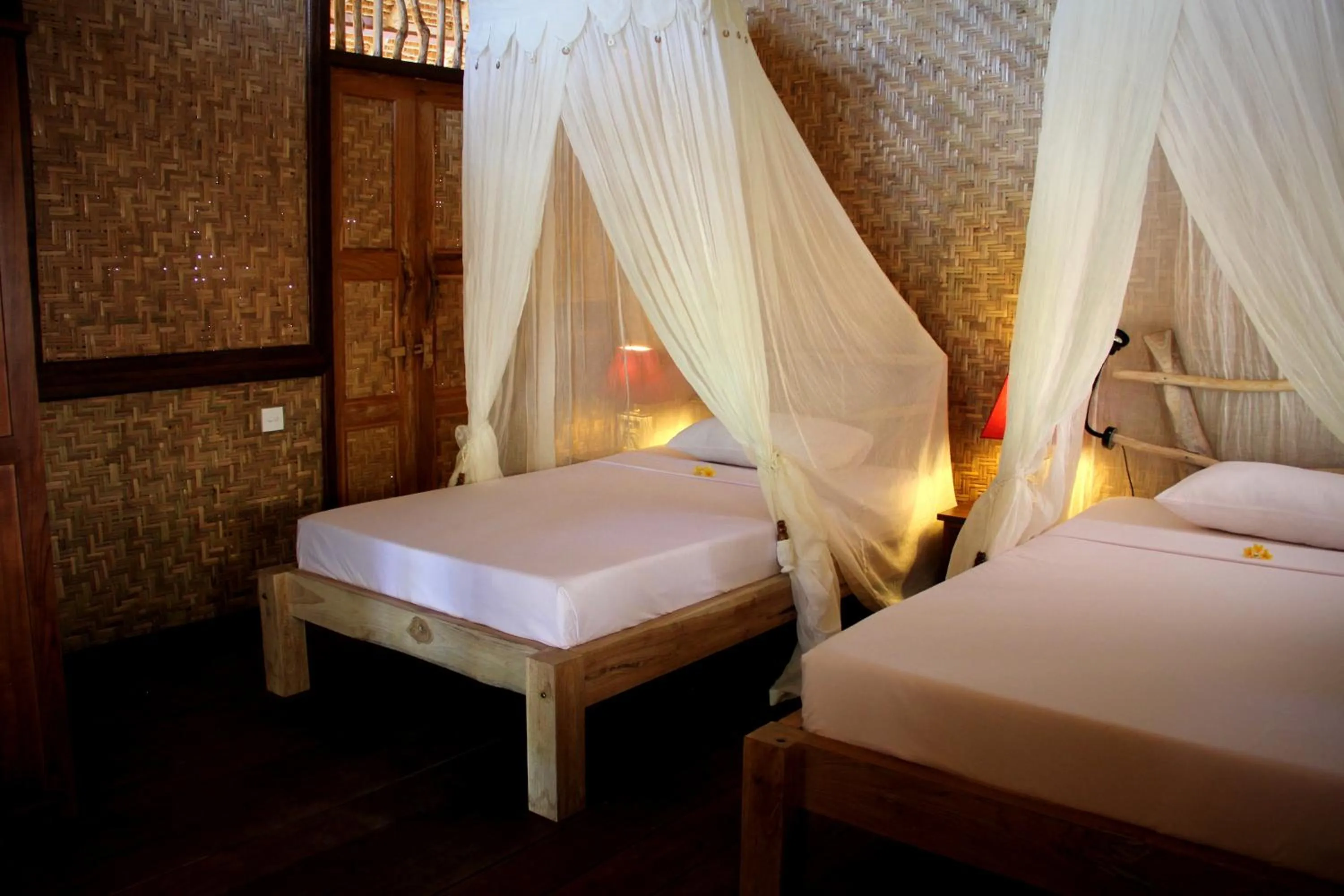 Bed in The Calmtree Bungalows