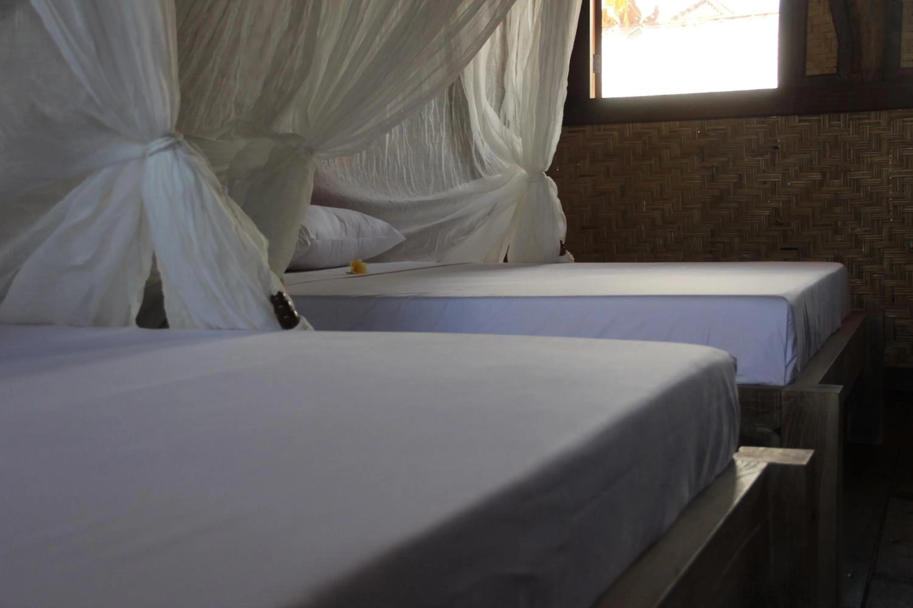 Bed in The Calmtree Bungalows