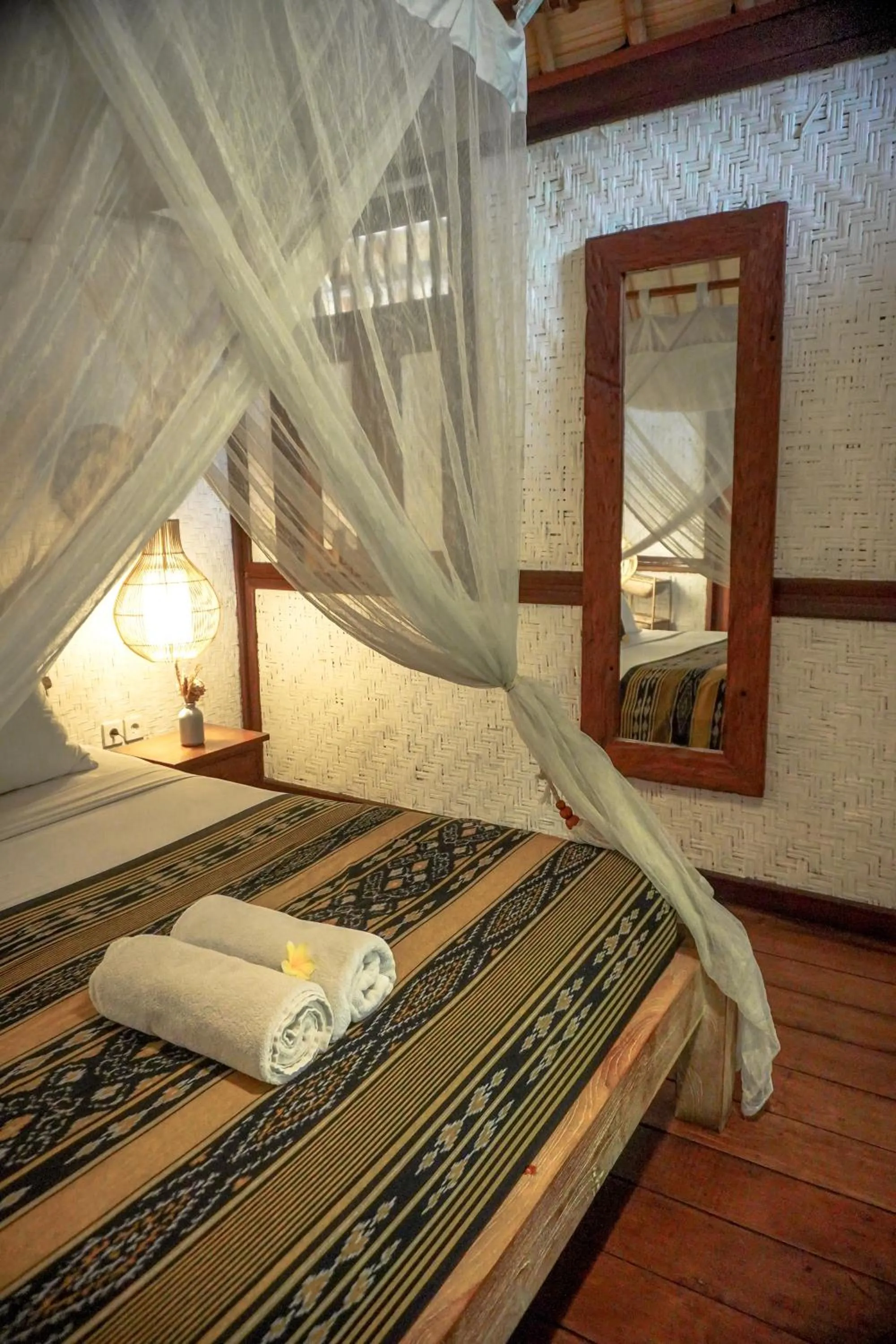 Bed in The Calmtree Bungalows
