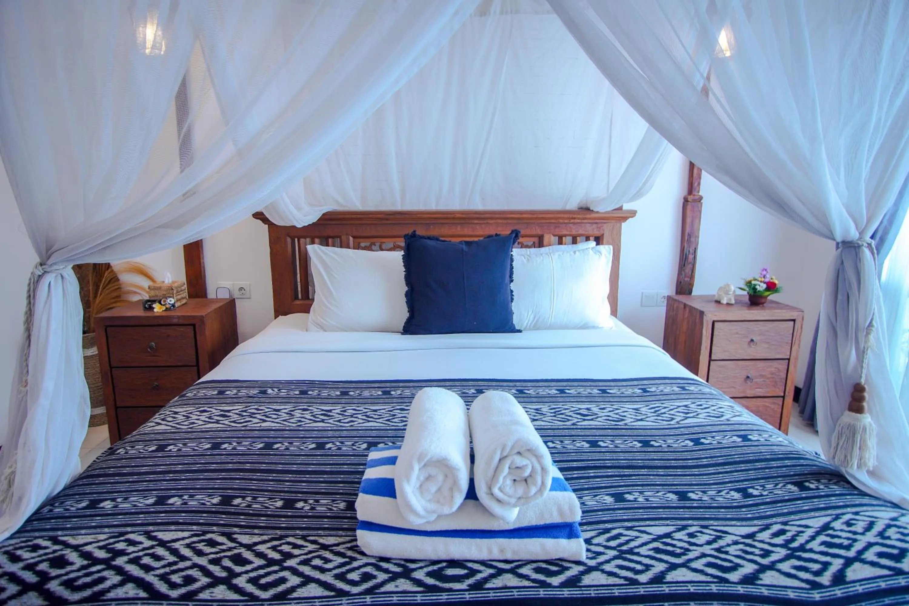 Bed in The Calmtree Bungalows