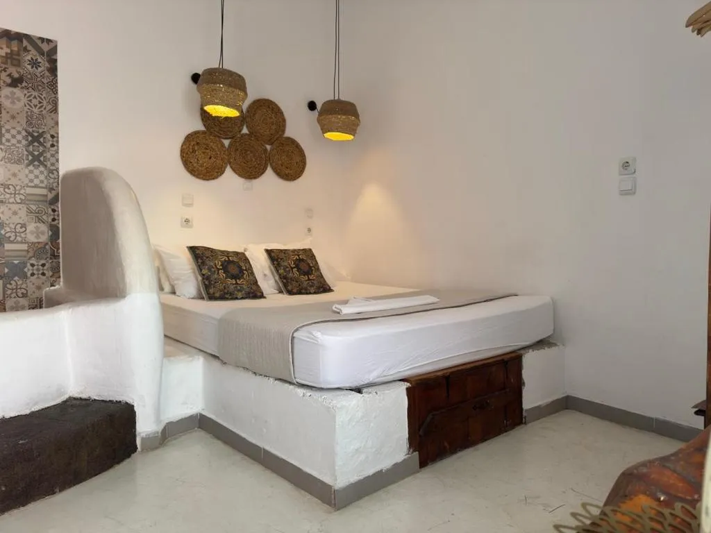 Bed in Mascot Garden Rooms