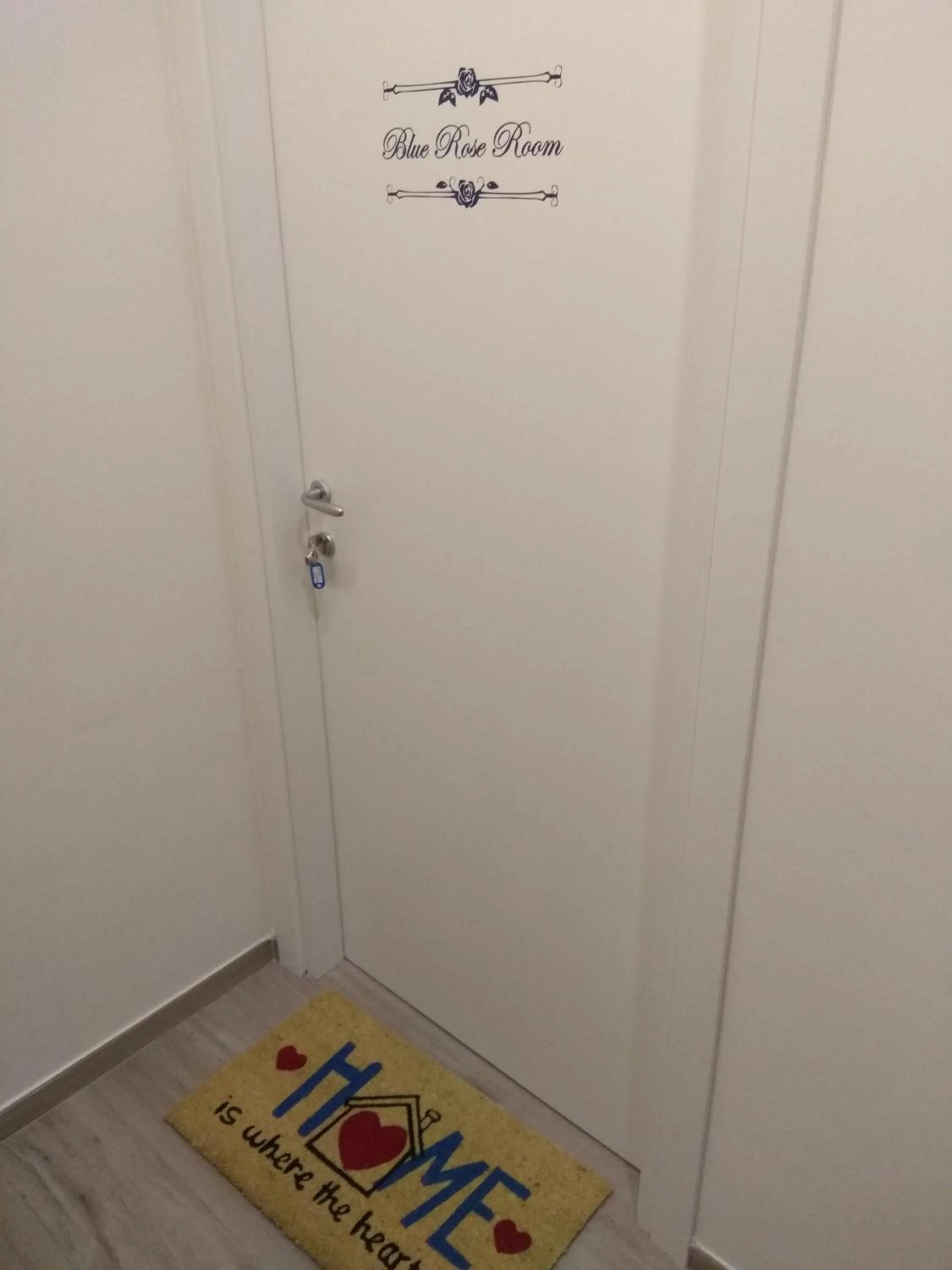 Property logo or sign in Blue Rose Private Room