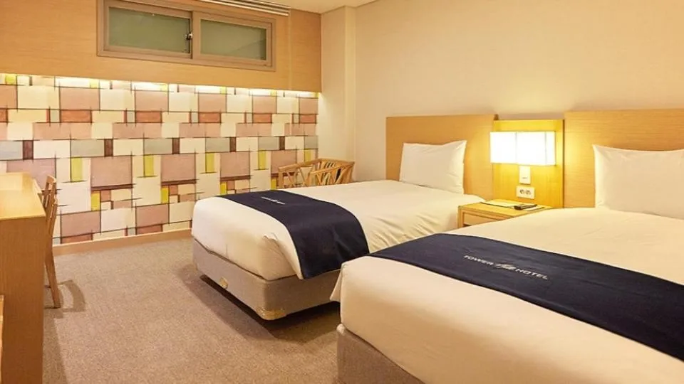 Bed in Towerhill Hotel