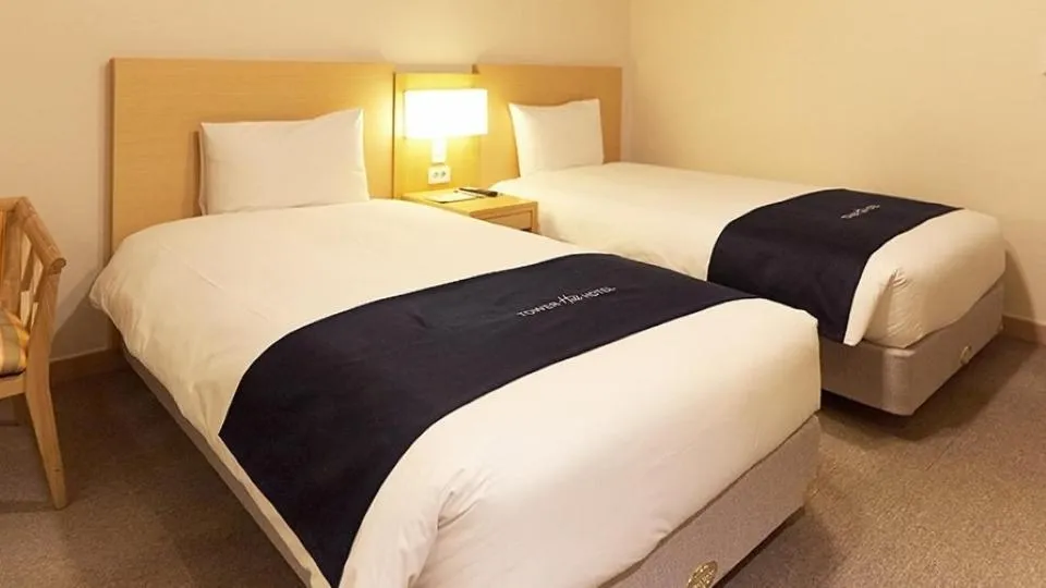 Bed in Towerhill Hotel