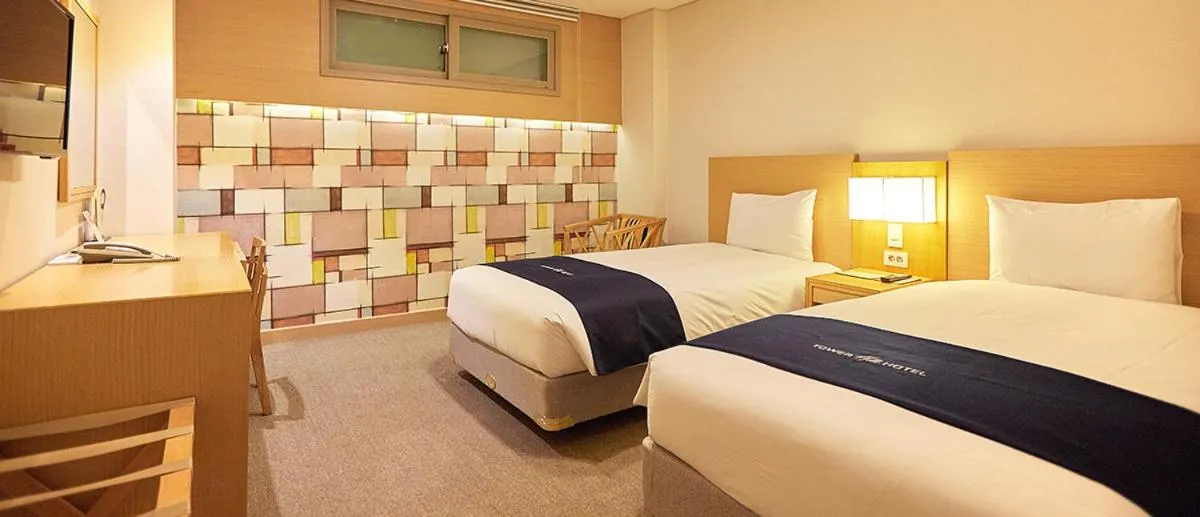 Bed in Towerhill Hotel