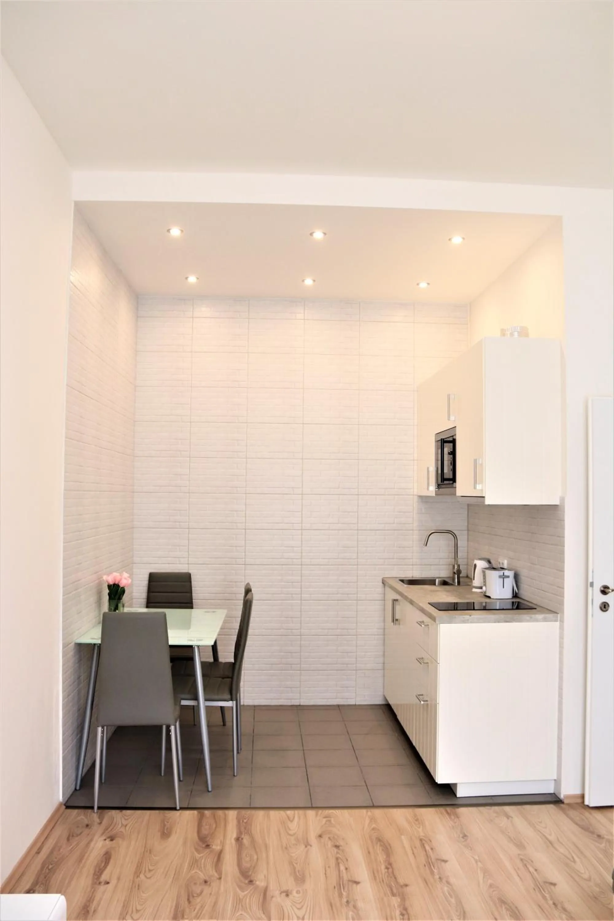 Kitchen or kitchenette in Flowers apartments