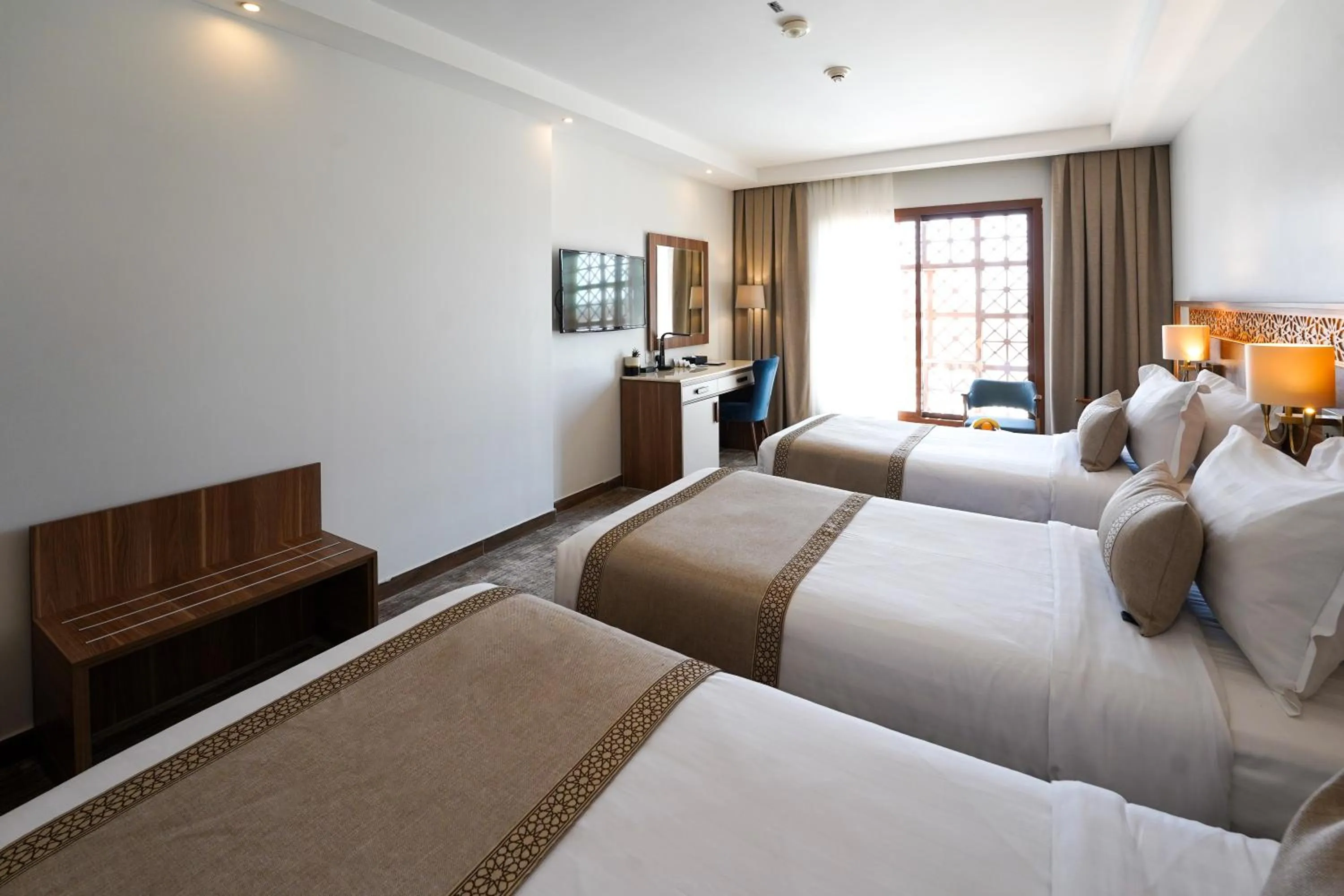 Bed in Le Bosphorus Hotel - Waqf Safi