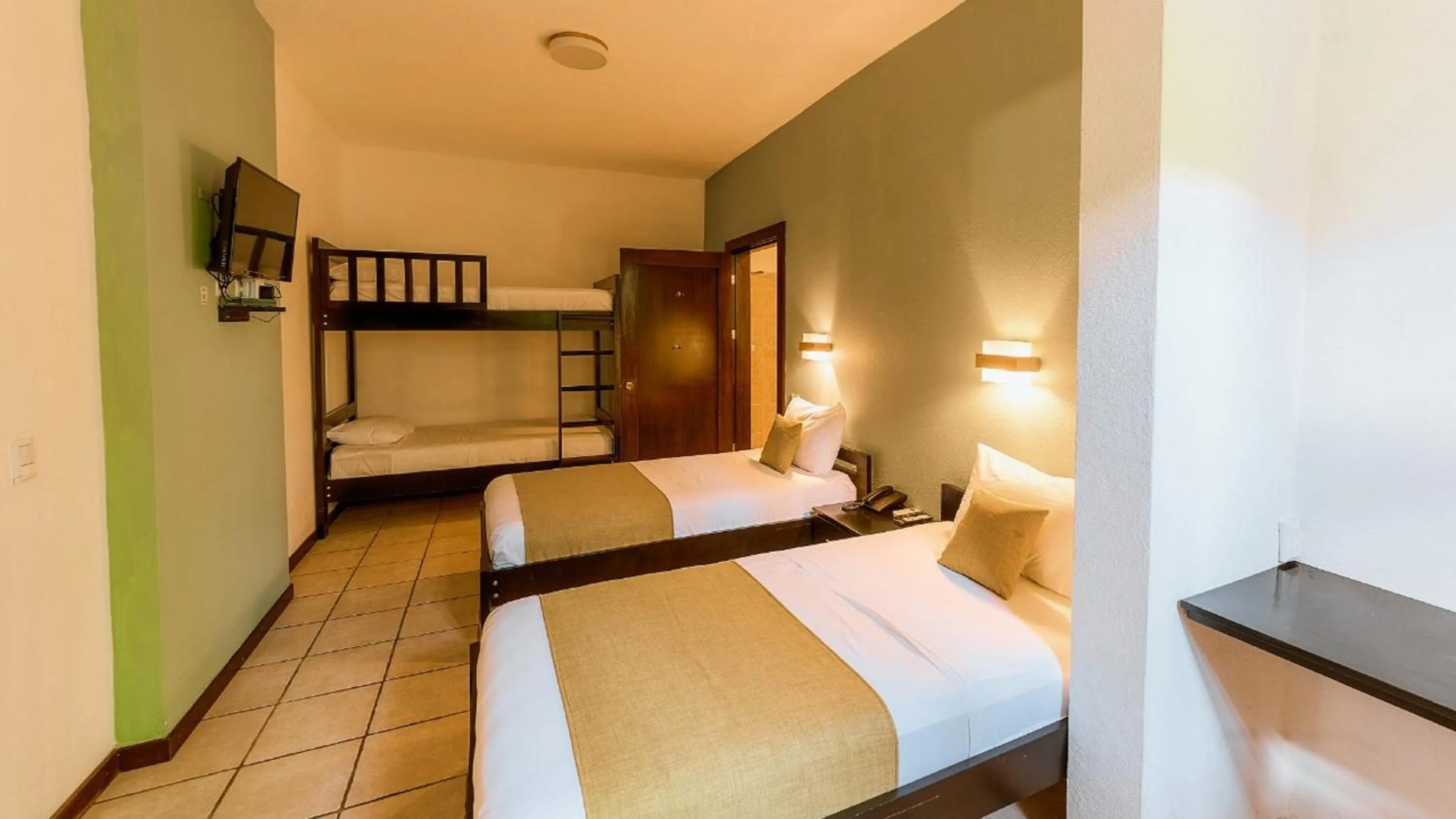 Bed in Terrazas del Caribe Hotel
