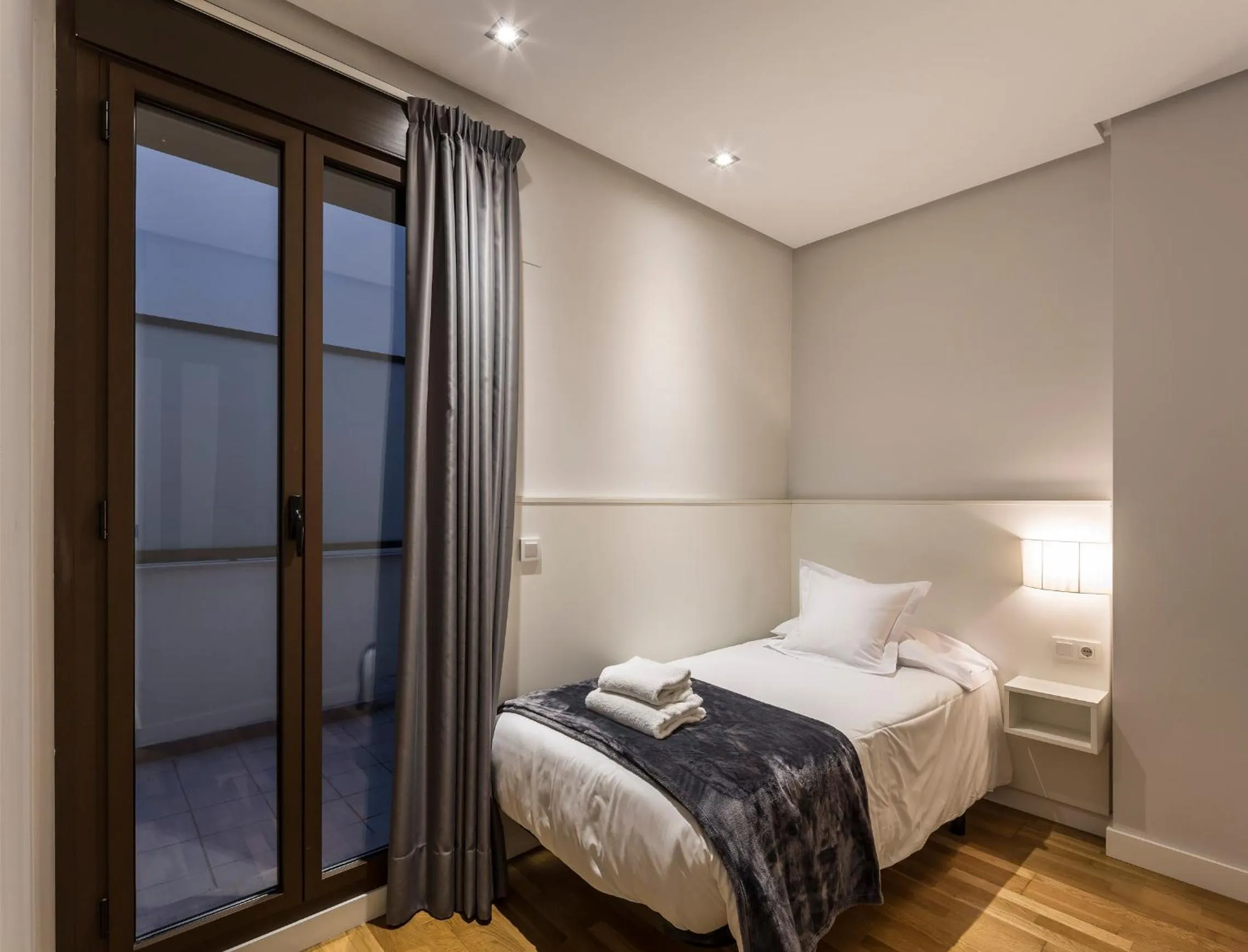 Bed in Mon Suites Catedral