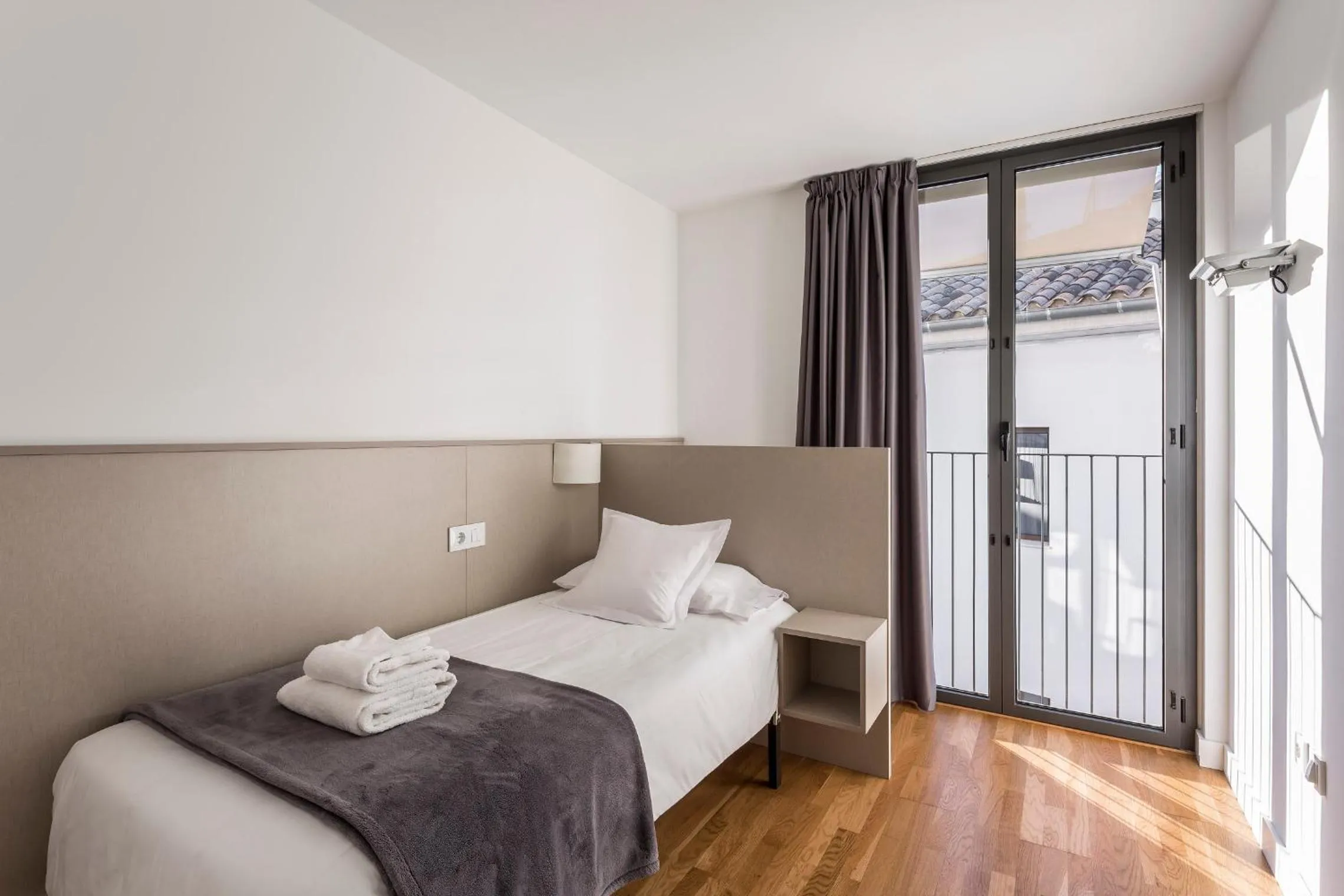 Bed in Mon Suites Catedral